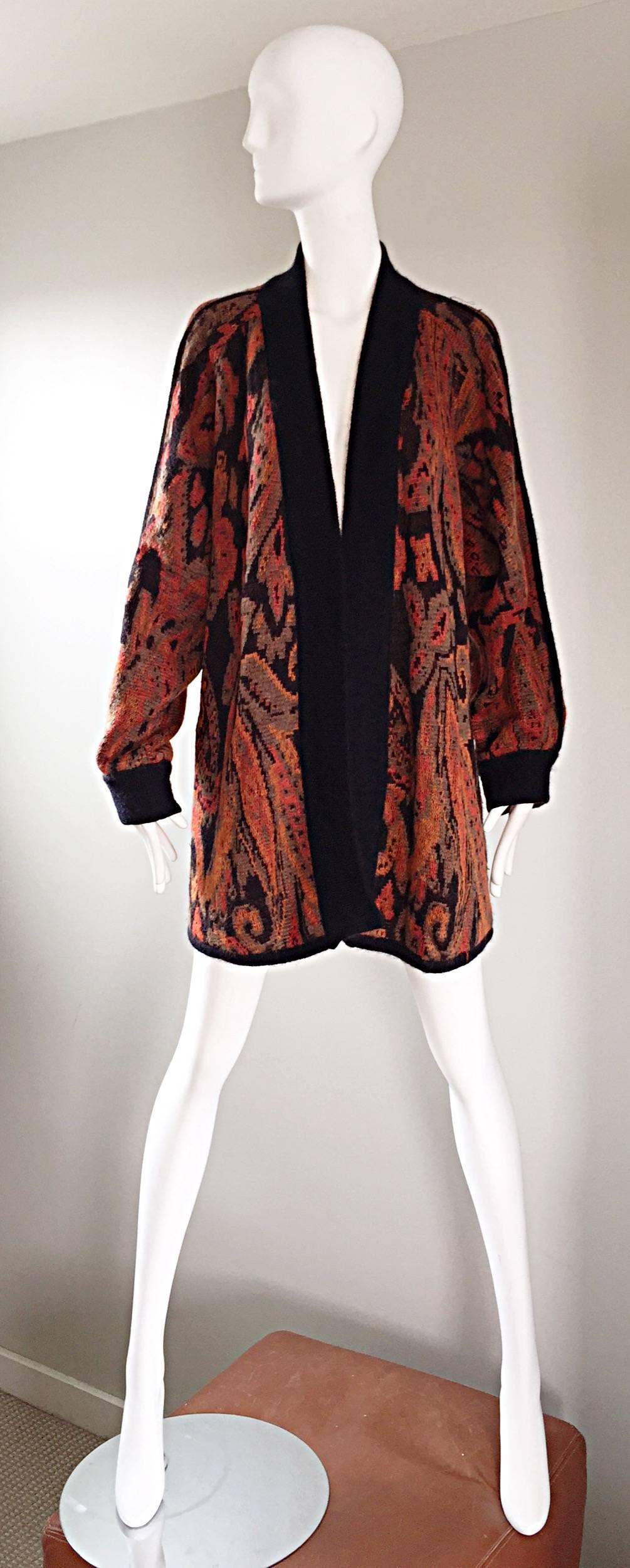 Exceptional vintage ESCADA by MARGARETHA LEY slouchy open front cardigan sweater. Super soft mohair and wool blend feels so nice against the skin. Warm autumnal colors of burnt oranges and Browns. POCKETS at both sides of the waist. Looks great