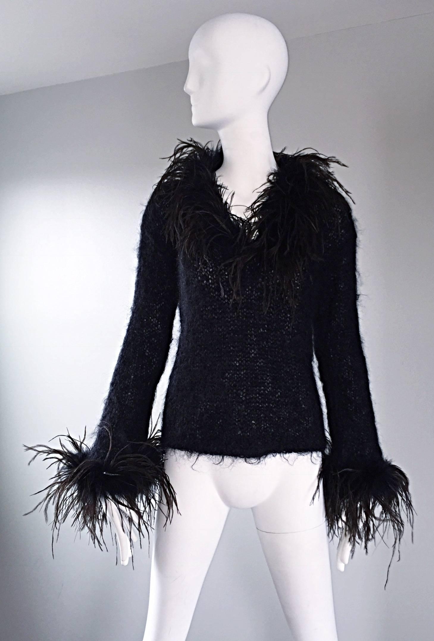 Amazing vintage 90s Italian designer mohair and ostrich feather black sweater! The label has been cut off, but the Made in Italy tag remains. Amazing construction, with so much detail! Super soft mohair, with dramatic ostrich feathers at the collar,