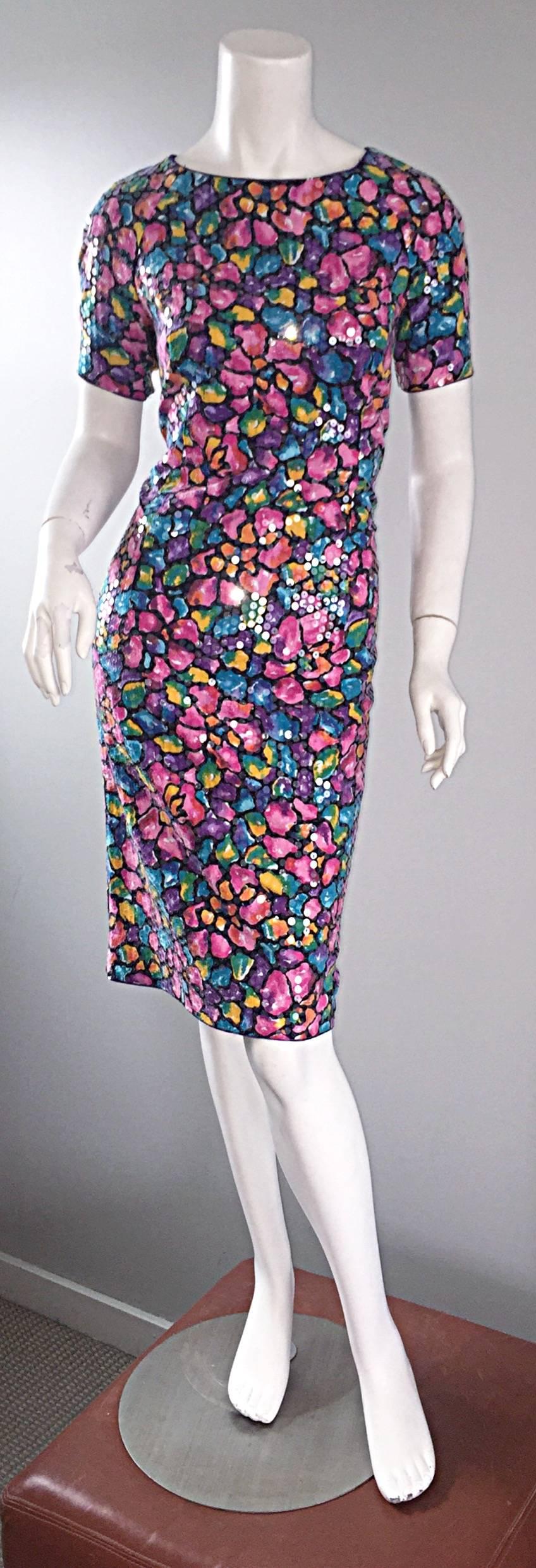 Beautiful vintage SAKS 5th Ave 1990s fully sequined dress! Features thousands of iridescent clear sequins throughout the entire dress. Colorful soft cotton, with a pretty flower print. Crisscross back, with snaps (easier to get on and off). Hidden