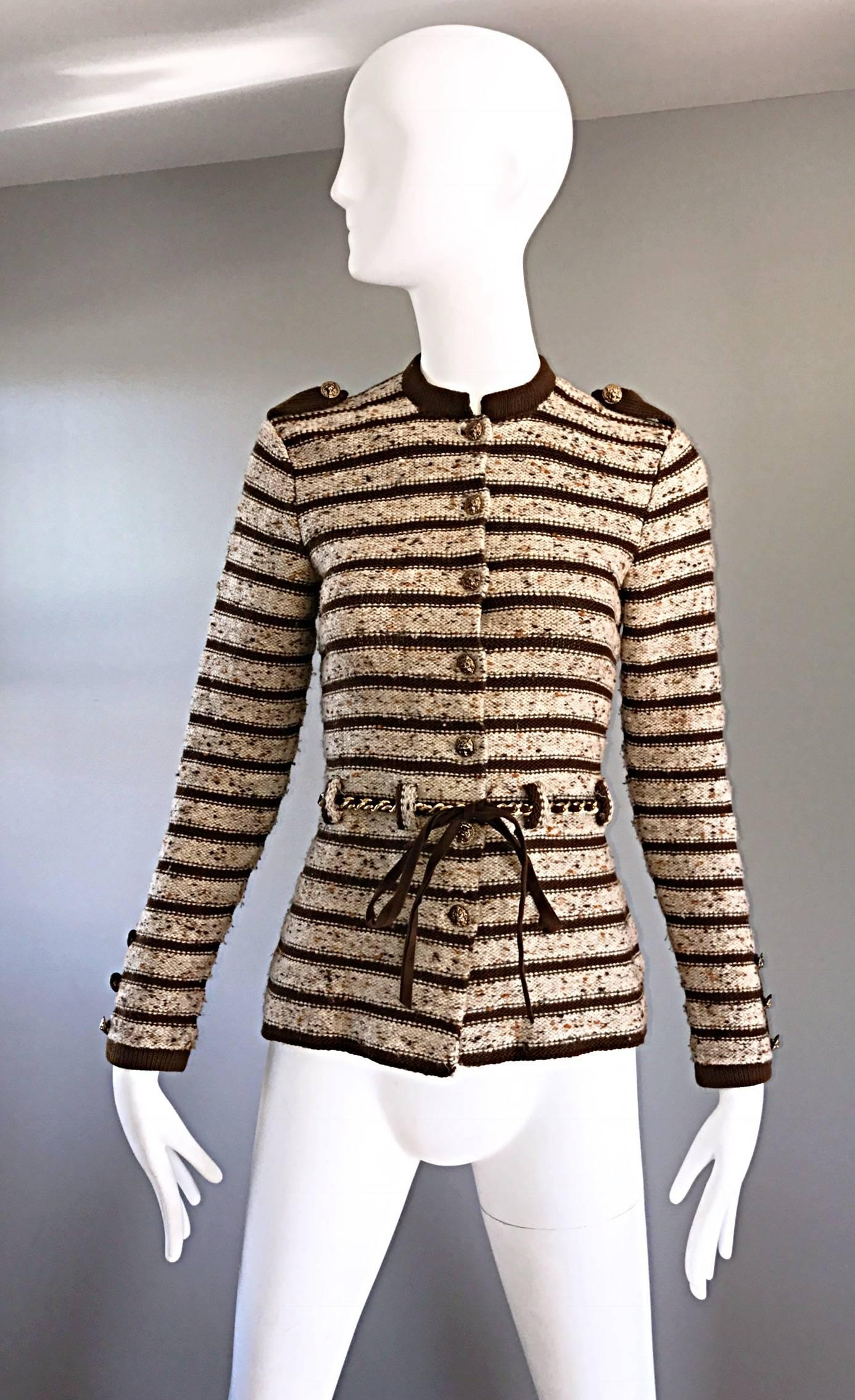 Classic and chic 1970s ADOLFO for SAKS FIFTH AVE. brown and ivory military inspired belted cardigan! Super soft with a wonderful tailored fit. Brass gold buttons up the bodice and at top shoulders. Detachable brass gold and brown leather chain belt.