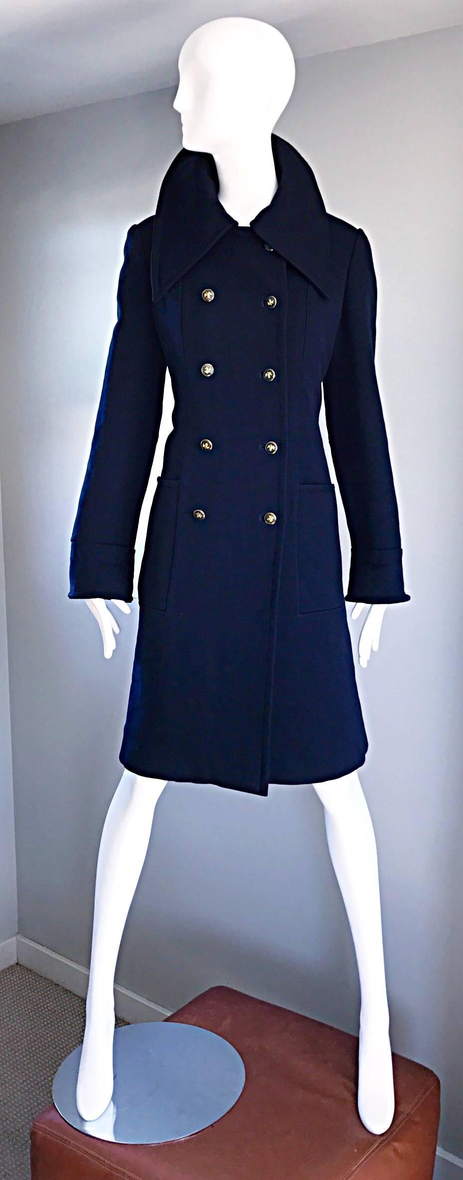 Incredibly chic, stylish and timeless vintage 70s LUBA for SAKS FIFTH AVENUE navy blue long wool peacoat! Flattering tailored fit. Military inspired double breasted style. Gold / Brass novelty buttons down the bodice, and at the back self belt.