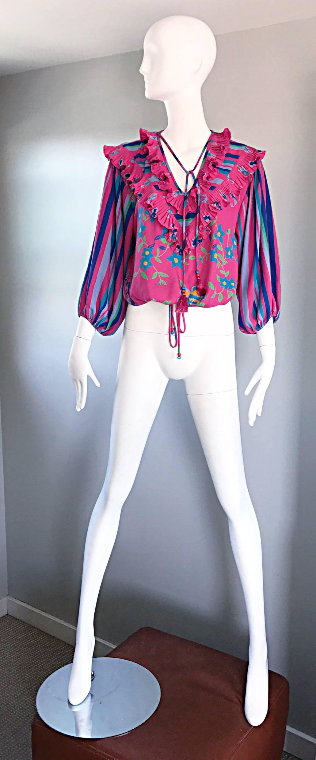 Chic vintage 80s DIANE FREIS / FRES pink, blue, green, marigold, and lavender bohemian top! Features Allover prints of flowers and stripes. Ruffle details at bust and shoulders. Tassels at bust feature beads and fringe at ends, and can be tied or