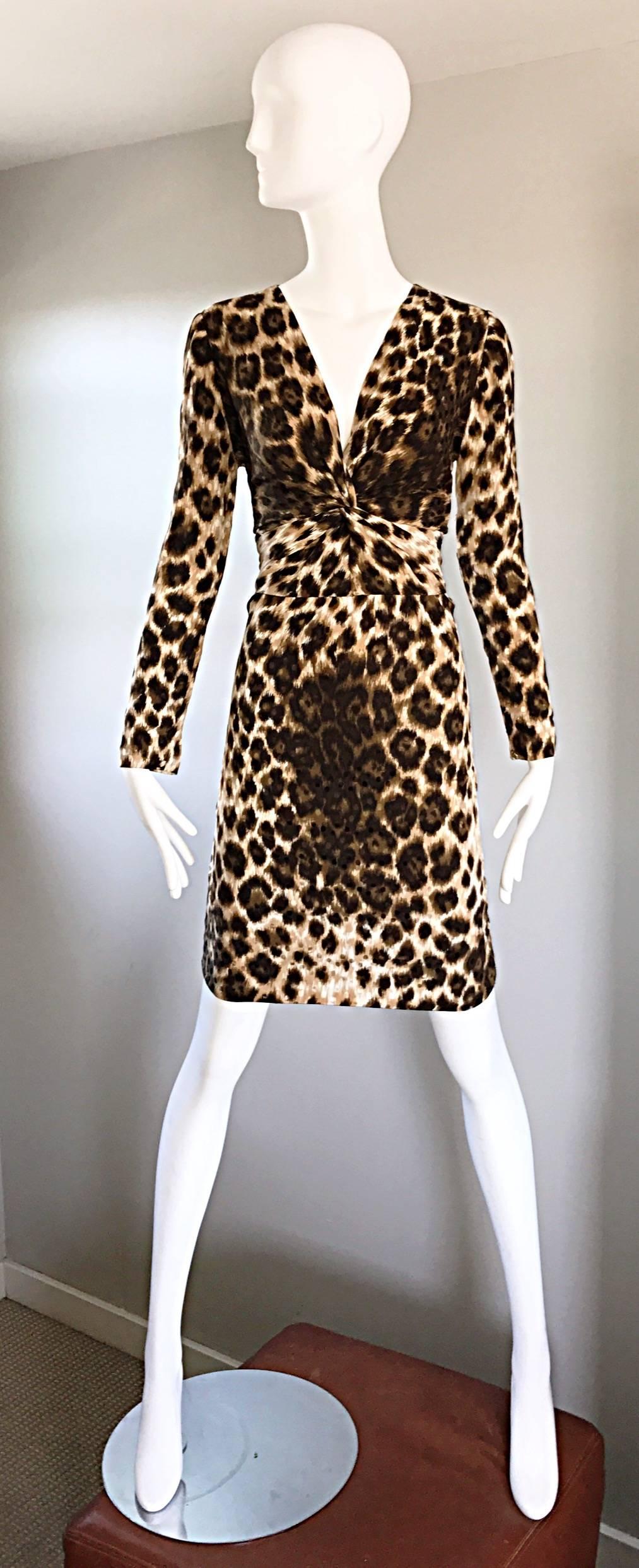 Sexy and rare vintage GIVENCHY by ALEXANDER MCQUEEN animal print silk dress! Features a stunning leopard / cheetah print throughout in browns, tans, and beige. Flattering rushing detail at waist and bottom bust. Sleek long sleeves, with a tailored