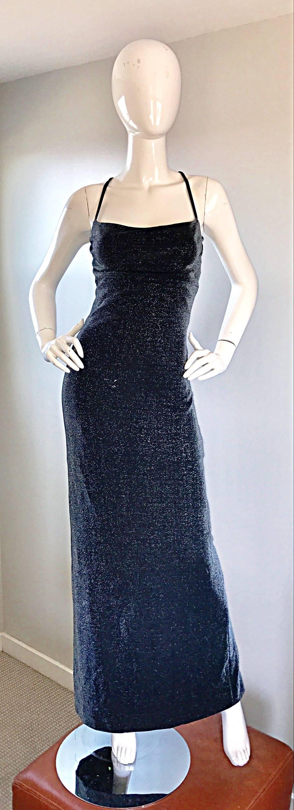 Sexy vintage early 1990s GIANNI VERSACE metallic gray / gunmetal full length bodcon evening dress! Insanely flattering fit, with a crisscross back, and daring split up the center back. Grecian like bodice with just the slightest bit of drapery at