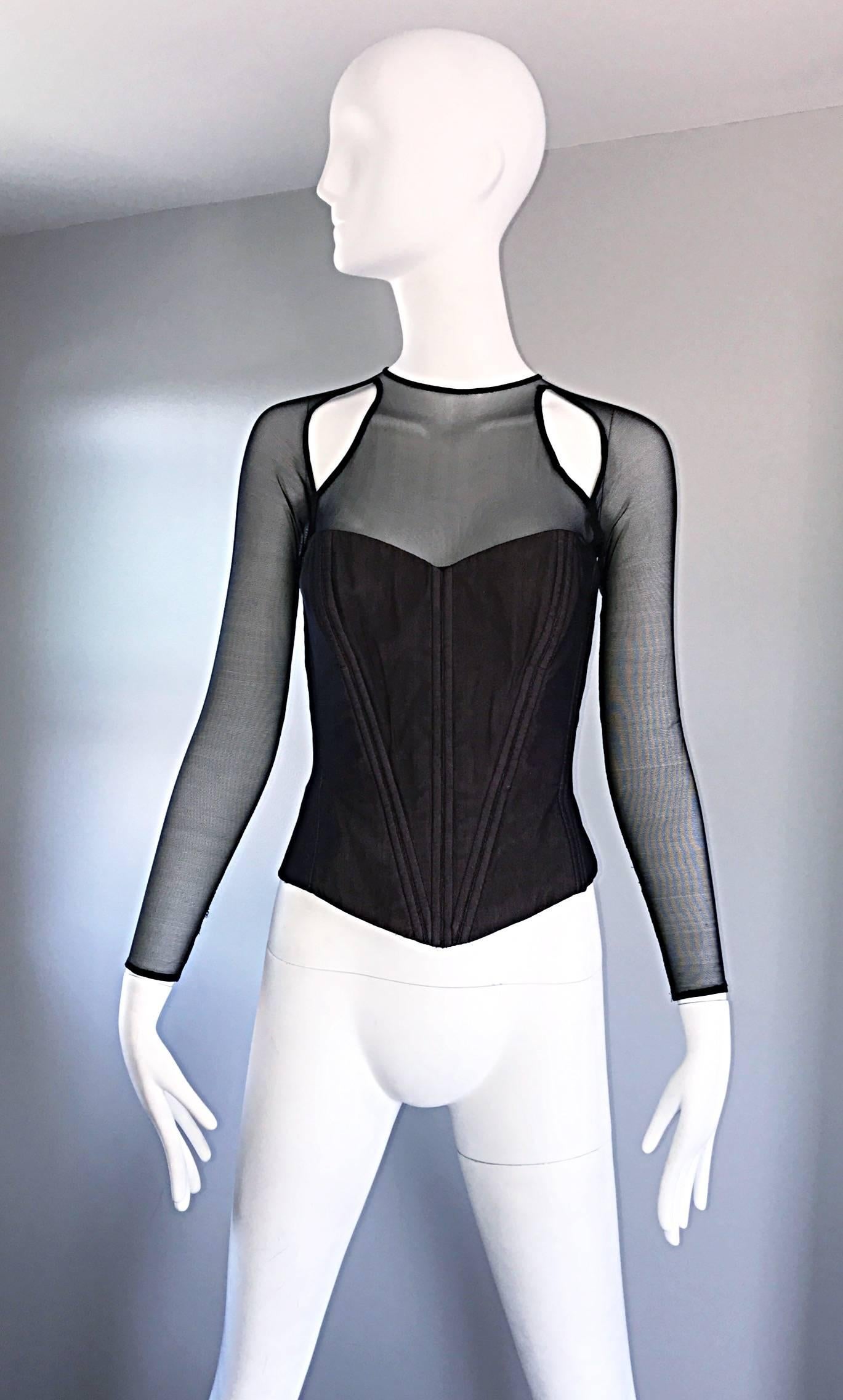Sexy vintage late 80s / 1980s VICKY TIEL COUTURE black silk moire cut-out bustier corset! Features a silk moire bodice, with a mesh overlay. Cut-outs at top front shoulders, and back shoulders. Long semi sheer fitted mesh sleeves. Boned bodice is