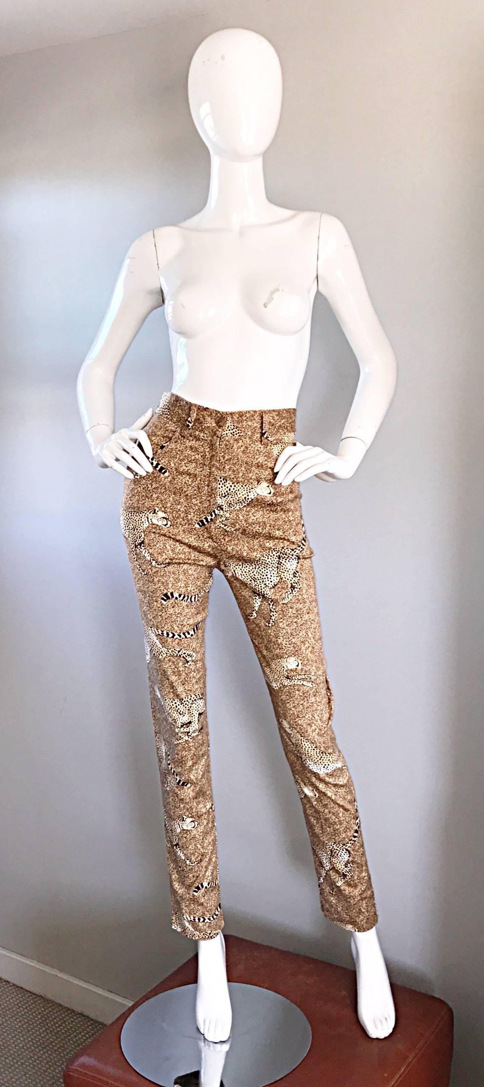 Amazing and rare 90s vintage KENZO high waisted slim fitted 'running cheetahs' tailored skinny trousers! Incredibly flattering fit! Features dozens of running cheetahs / leopards throughout. Zip crotch and button waistband. Pockets at each side of