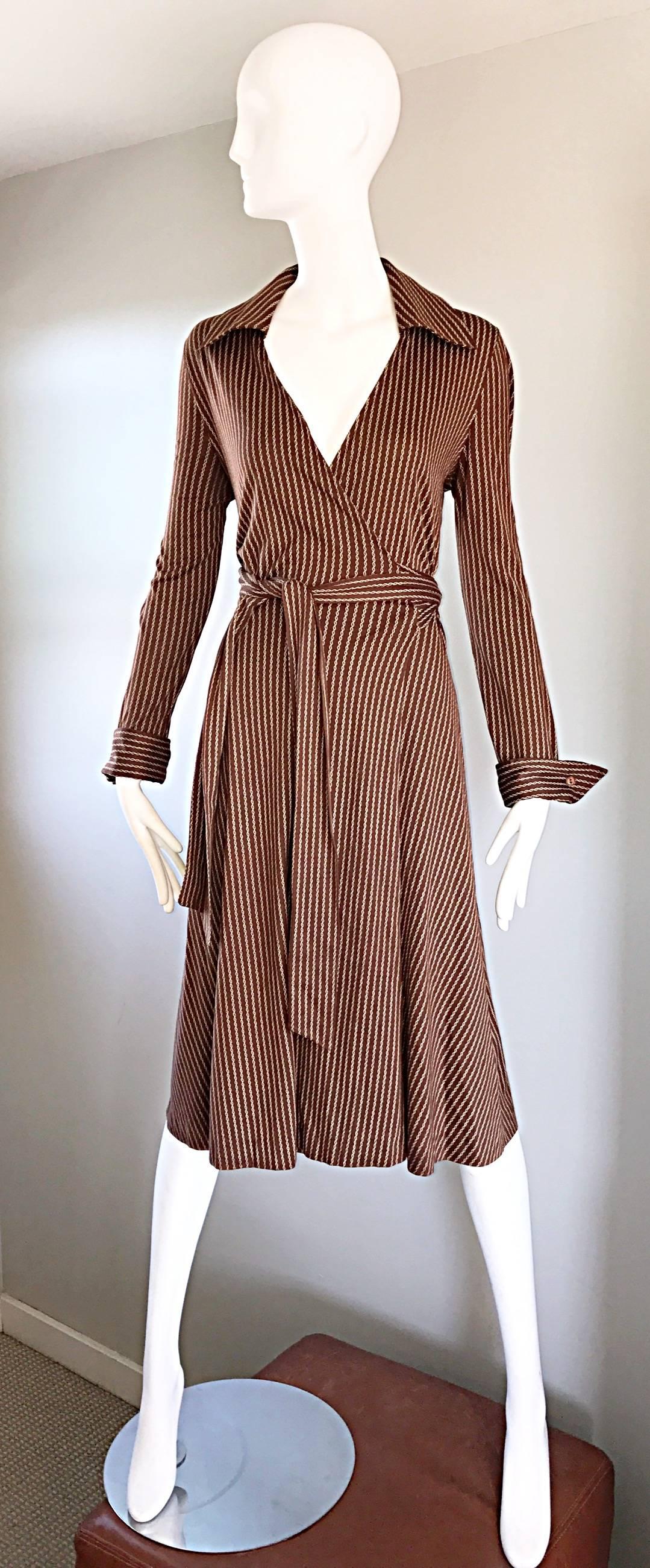 Insanely chic and rare 1970s DIANE VON FURSTENBERG (Made in Italy) brown and ivory chain striped long sleeve wrap shirt dress! Early DVF piece in the style that put the infamous designer on the map. Flattering tailored bodice, with a full skirt.