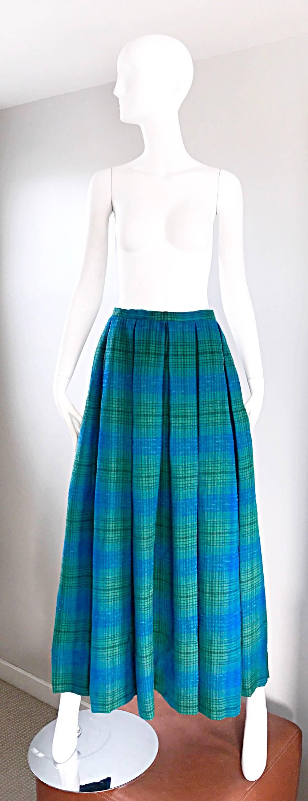 Chic, stylish, and wearable 1950s HENRI BENDEL (super soft) Virgin wool full maxi skirt! Vibrant colors of turquoise blue and kelly green plaid throughout. Intricate pleating detail under the waistband. POCKETS at both sides of the waist. Hidden