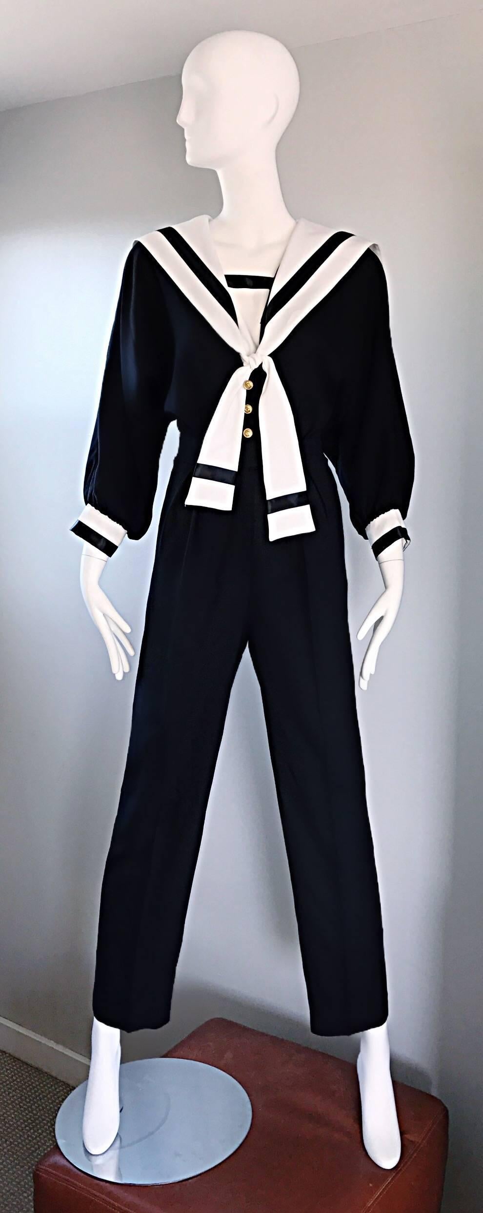 Rare vintage ANDREE GAYE 1980s black and white nautical sailor themed jumpsuit! Super chic, and so on trend! Black body, with a white collar and sleeve cuffs. Lapel features white ties that tie in the front bodice (can be worn loose, or in a bow).