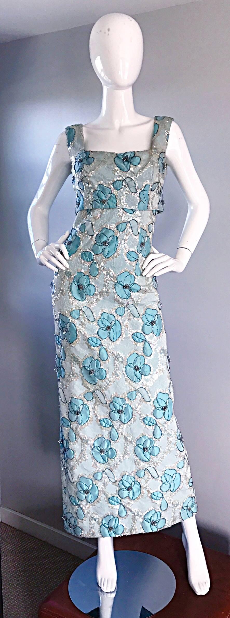 Outstanding late 1950s / early 1960s 60s BAIN'S Demi couture turquoise blue metallic beaded sequin gown! Features thousands of hand-sewn iridescent sequins and beads throughout. Shelf bust, with an attached top. Flower pattern throughout. Full metal