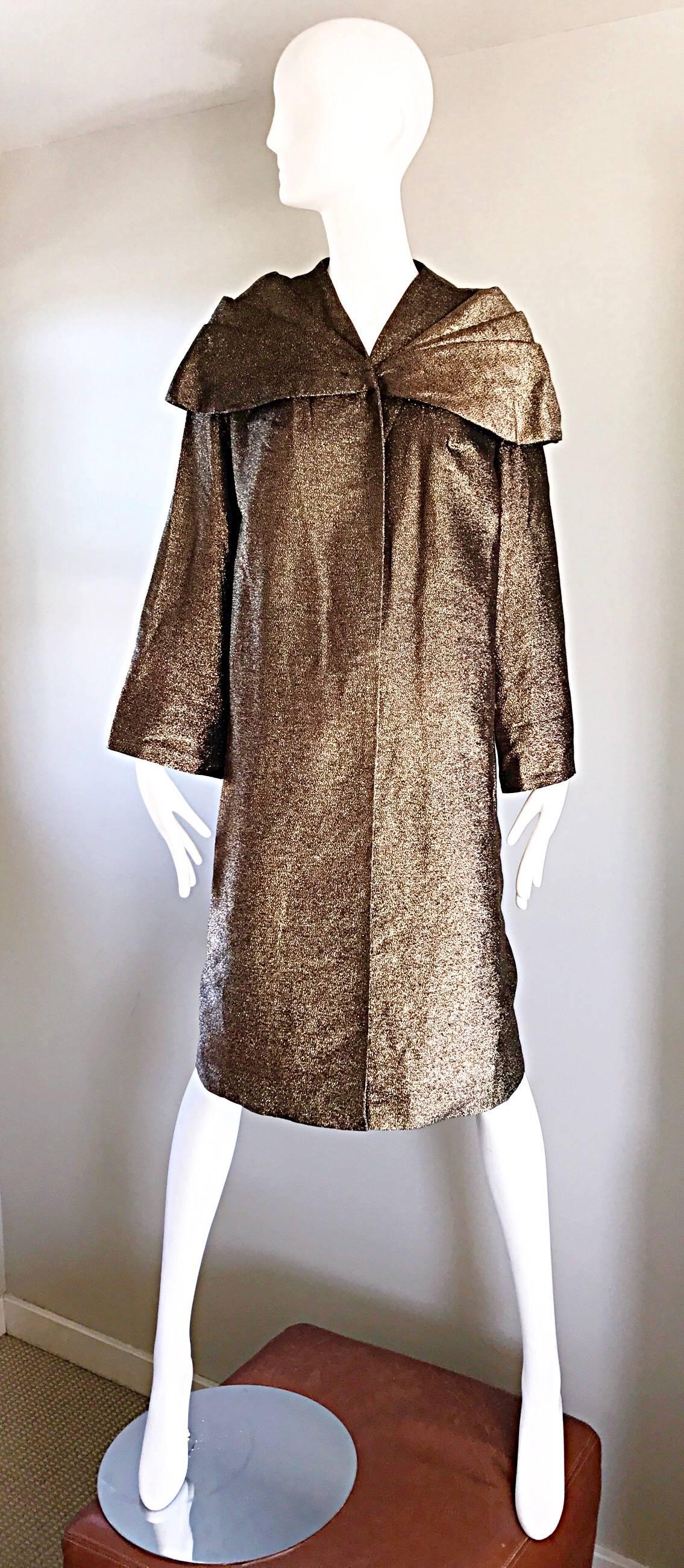 Sensational vintage 1950s bronze swing opera jacket! Avant Garde oversized collar. Couture quality, with excellent workmanship, with heavy attention to detail. Hidden hook-and-eye closure at top neck. Fully lined. Great weight that will keep you