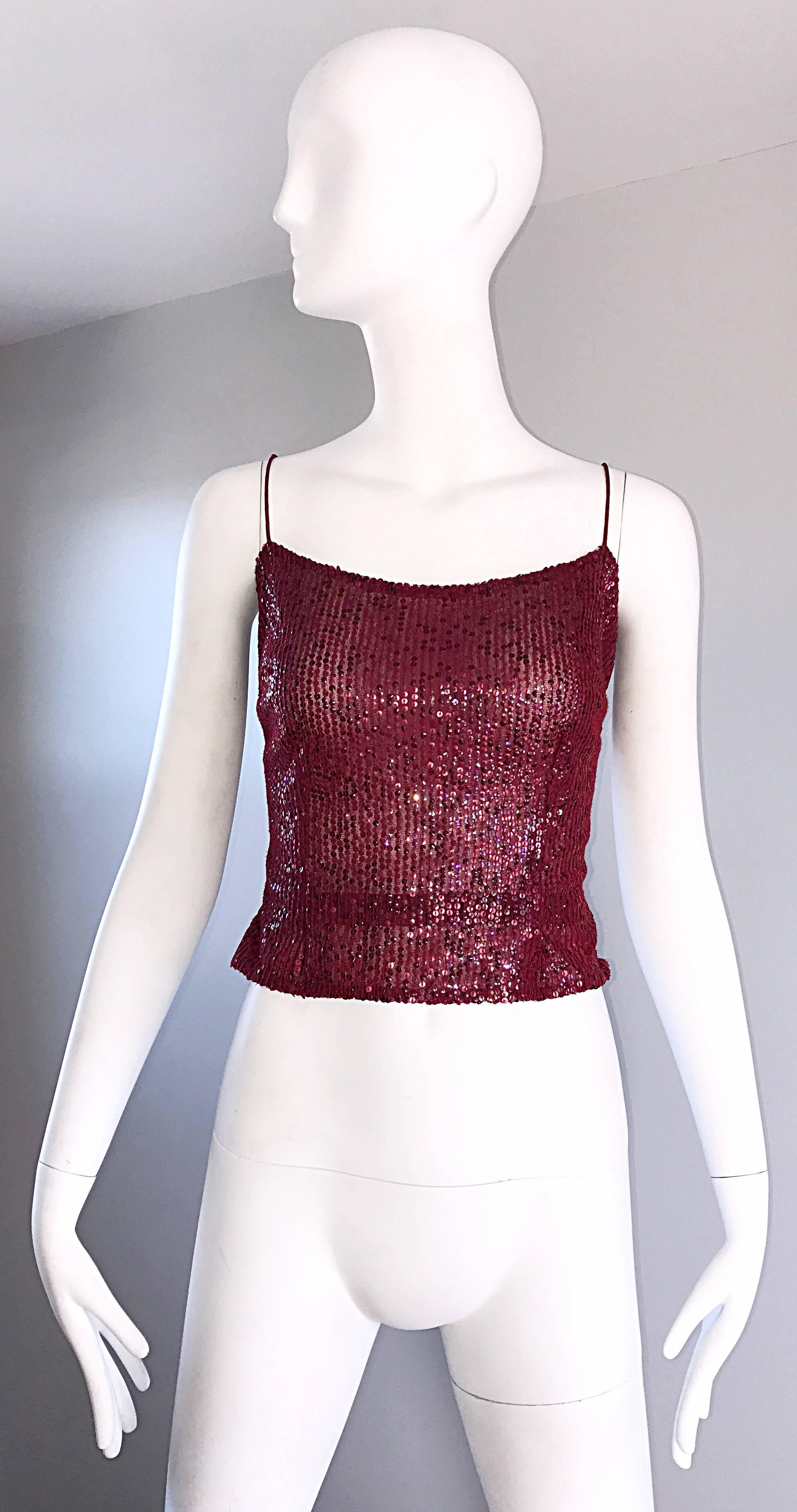 Beautiful vintage LIANCARLO red/wine colored sequined sleeveless top. Features thousands of hand-sewn sequins throughout. Built in interior support holds everything in place. Hidden zipper up the side. Couture quality, with amazing attention to