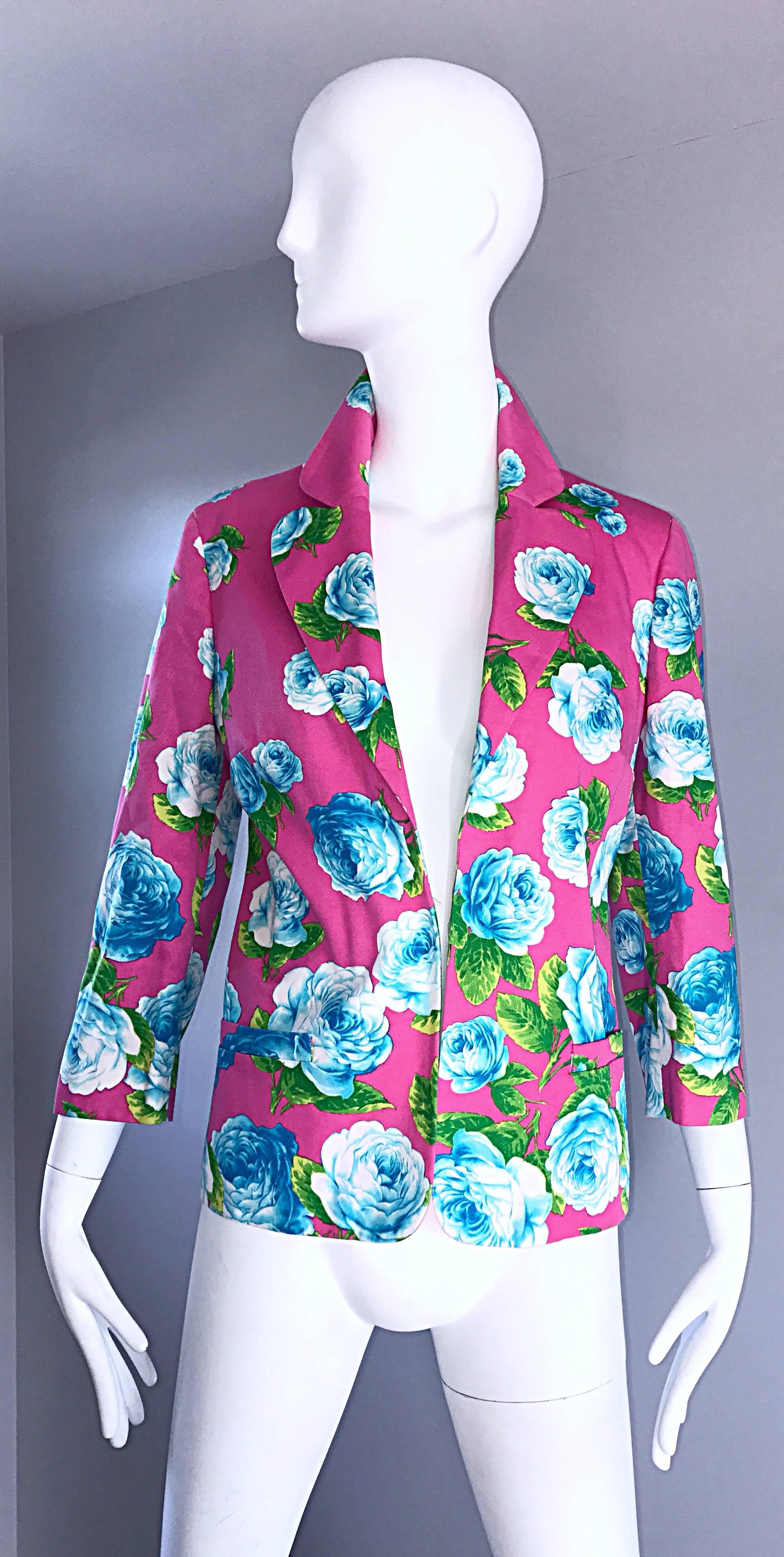 Chic early 1990s / 90s GIANNI VERSACE Versus fuchsia/ hot pink cotton blazer jacket! Features amazing blue and green rose print throughout. Great tailored bodice, with 3/4 length sleeves. Pocket at each side of the waist. Fully lined. Can easily be