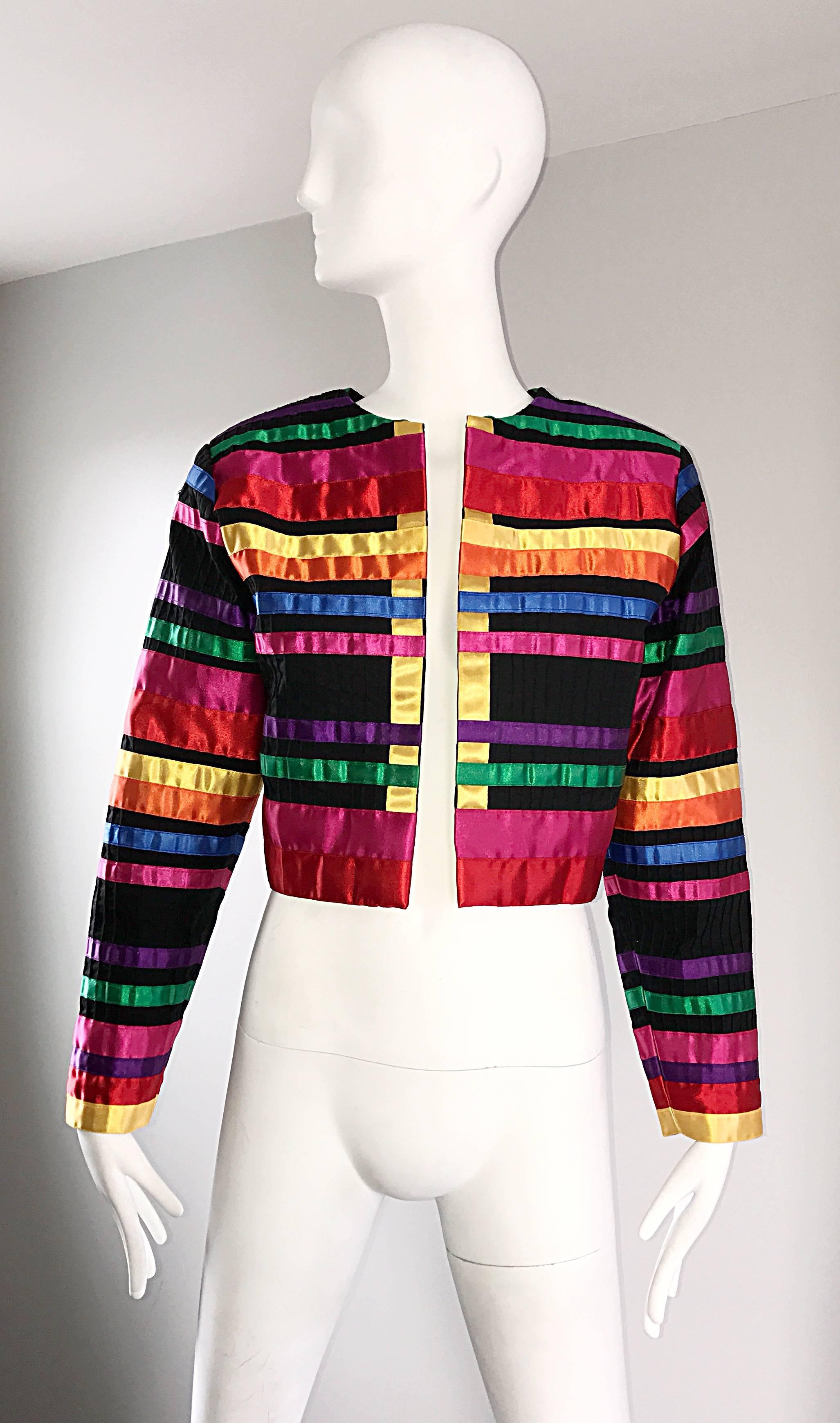 Wonderful vintage TACHI CASTILLO colorful rainbow cotton and silk cropped ribbon bolero jacket! Features vibrant hues of pink, green, yellow, orange, red, purple, blue, and black. The perfect thing to throw over any outfit to really add a pop! Can