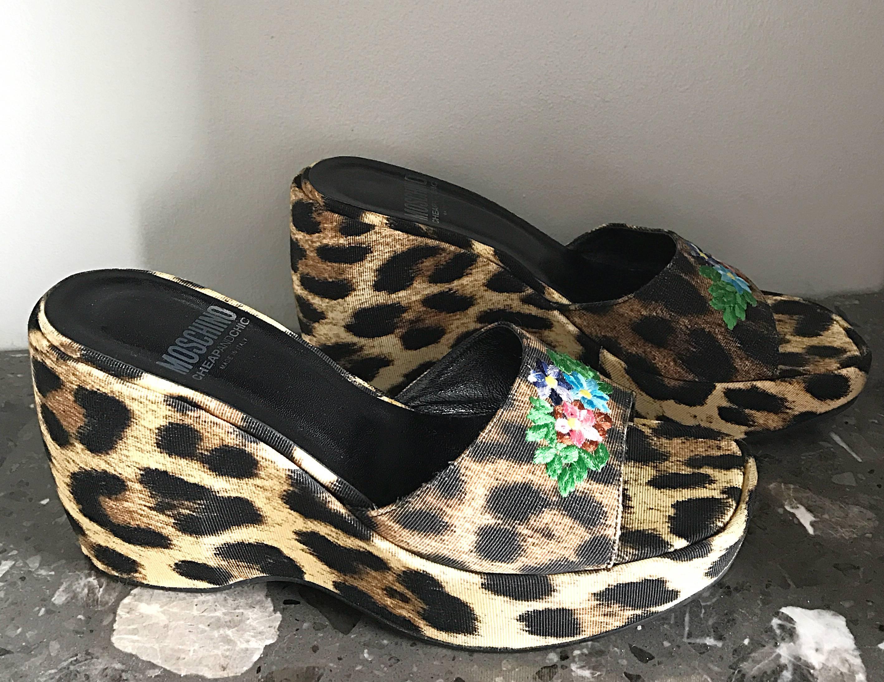 Never worn vintage 90s MOSCHINO Cheap & Chic leopard print slide wedges! Features an allover leopard print, with embroidered flowers. Comfortable, yet super stylish! Platform sole makes walking in these sandals easy! Can easily be dressed up or
