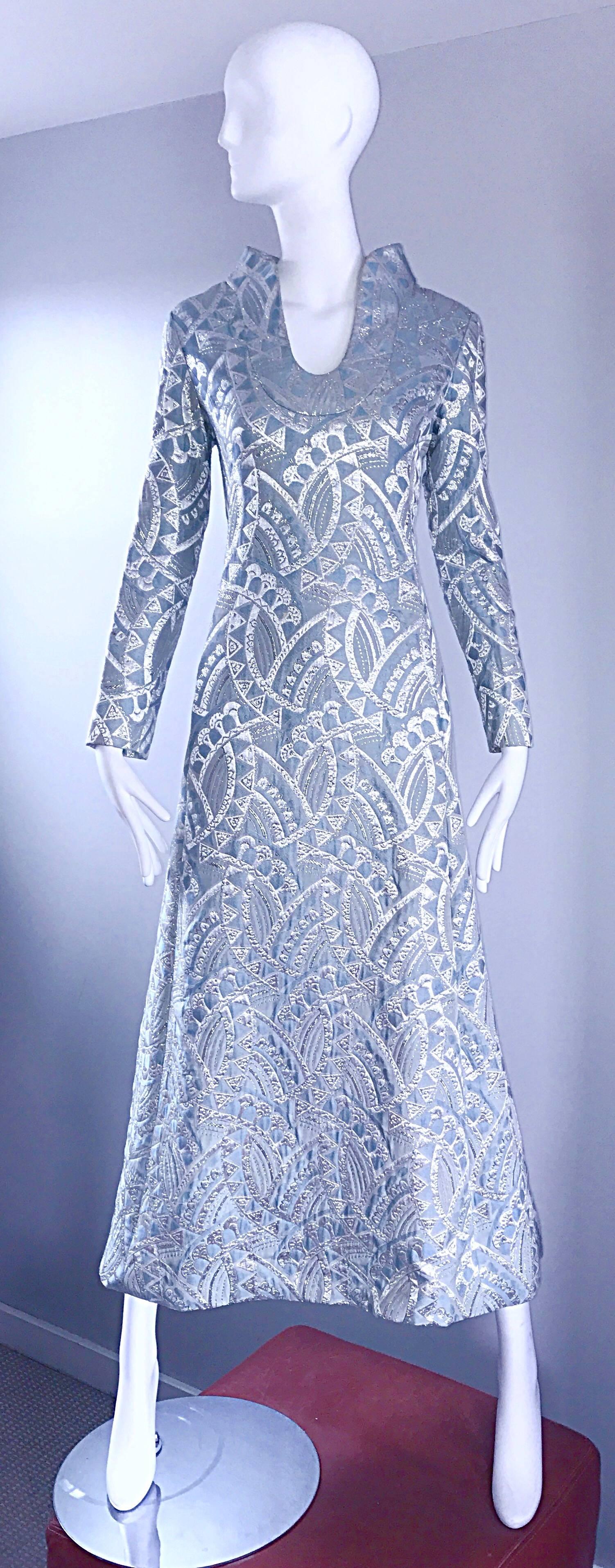Beautiful vintage 60s (late 1960s, early 1970s 70s) RIZKALLAH for MALCOLM STARR pale blue and silver silk brocade long sleeve evening dress! Features allover silver metallic geometric patterns throughout. Wonderful fitted bodice, tailored long
