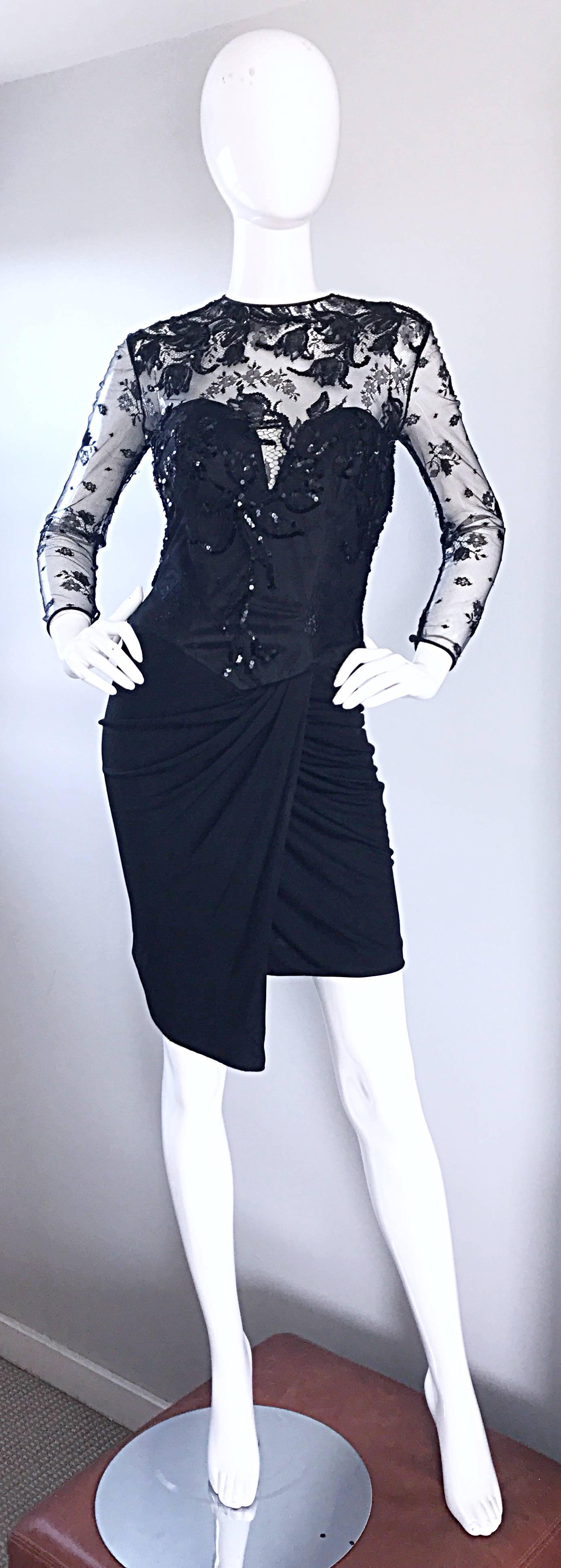 Sexy vintage 1980s / 80s VICKY TIEL COUTURE little black dress, with a twist! Features soft black silk jersey that hugs the body fantastically! Boned bodice, with a black lace overlay and hand-sewn sequins. Long tailored sleeves with button closure