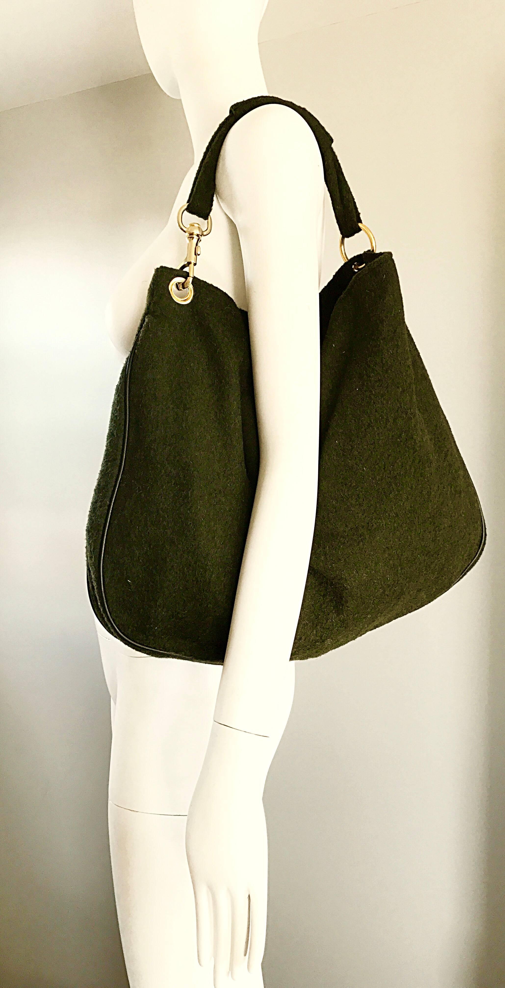 Chic and practical 1960s JOSPEH MAGNIN Italian made dark forest green virgin wool and leather JUMBO hobo handbag! Allover gorgeous dark green soft wool, with leather piping at edges. Strong snap closure. Handle in the same green wool, with removable