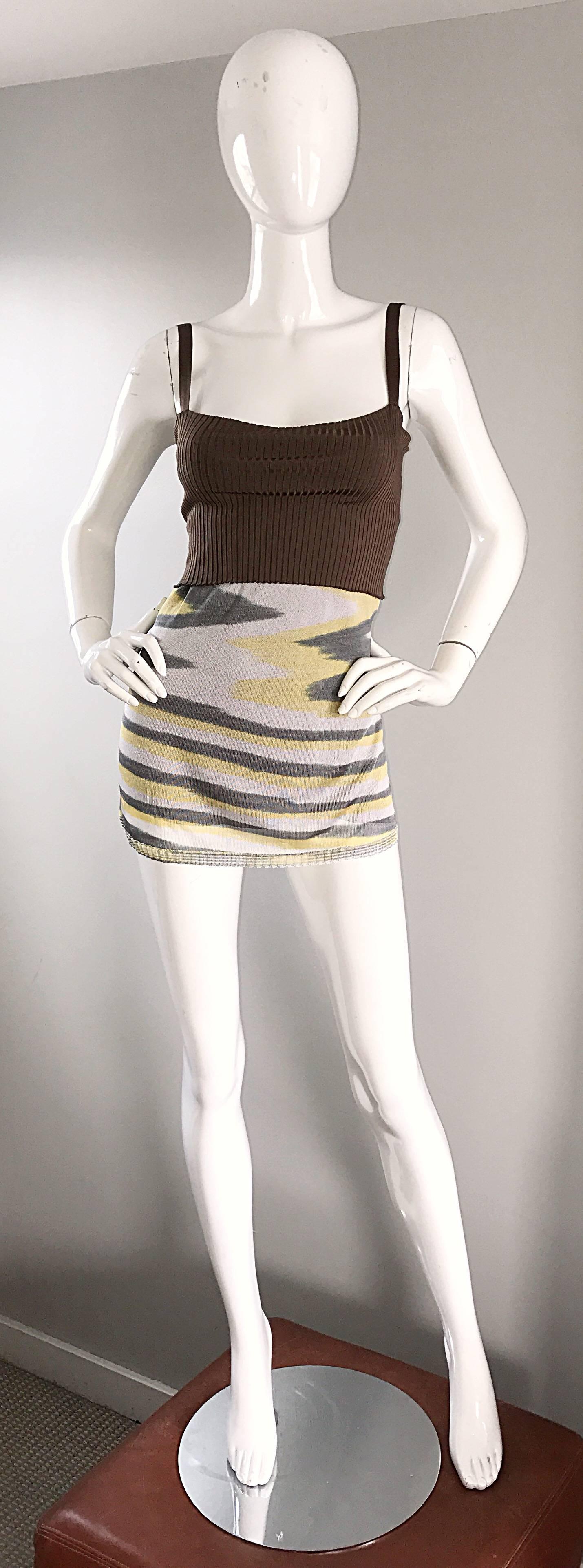 Early 1990s Missoni signature zig zag 3 - in - 1 ! Can easily be a mini dress, strapless dress, tunic top, or a skirt! Features fantastic warm colors of yellow, brown, grey and white. Ribbed silk bodice, with a stretch silk and rayon torso. Great