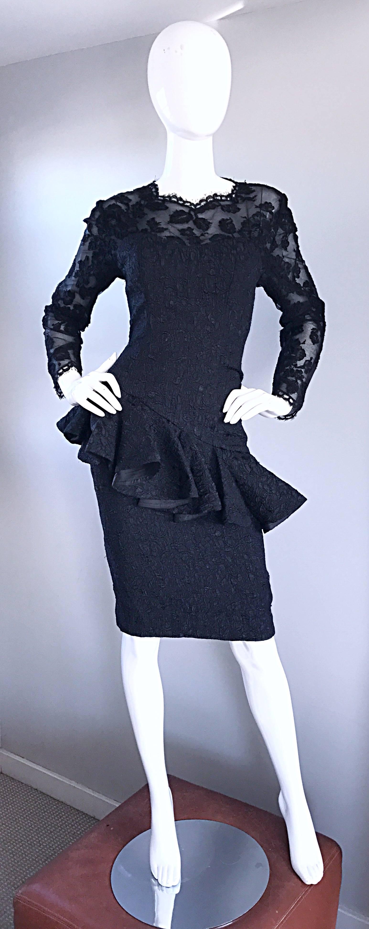Amazing vintage 1990s LIANCARLO COUTURE black silk chantily French lace peplum Avant Garde cocktail dress! Features a nude illusion bodice, with a fitted torso, and flared peplum. Hidden zipper up the back with hook-and-eye closure. The perfect