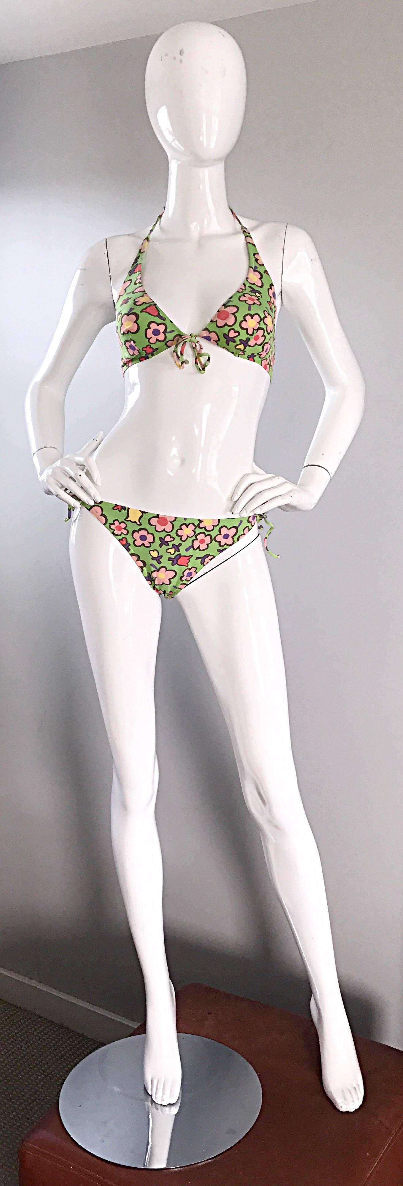 Sexy new vintage MOSCHINO bright neon green 90s swimsuit ! Features colorful flowers printed in pink, fuchsia, yellow, and purple. Ties at each side of the waist, and at front bust. Super flattering string bikini great for the pool or beach! In