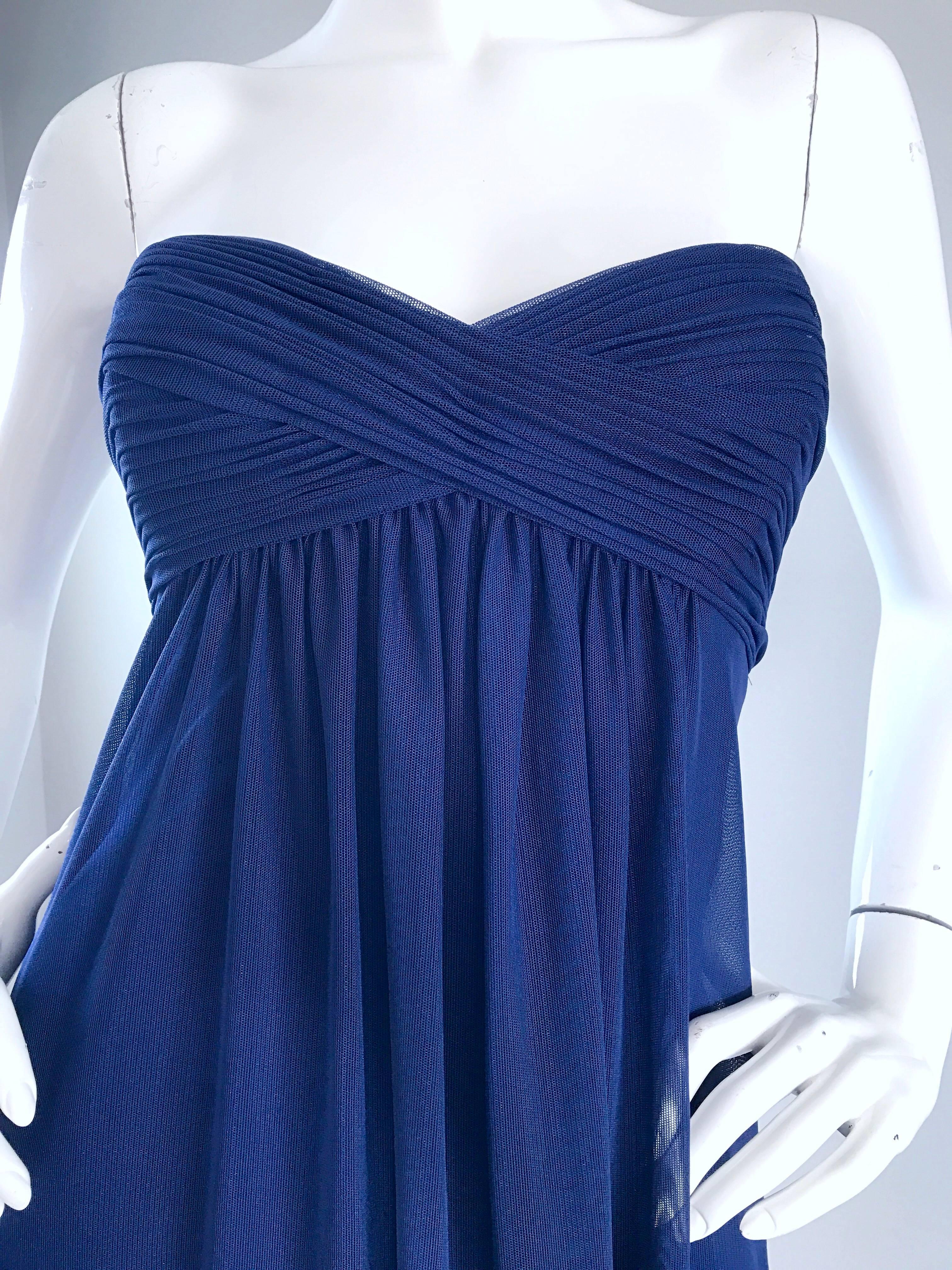 Stunning vintage VICKY TIEL COUTURE rich navy blue strapless gown / maxi dress ! Features flattering ruched detail at the bust, with a free flowing empire waist fit. Navy mesh over navy blue silk. Boned bodice. Hidden zipper up the back. Impeccable