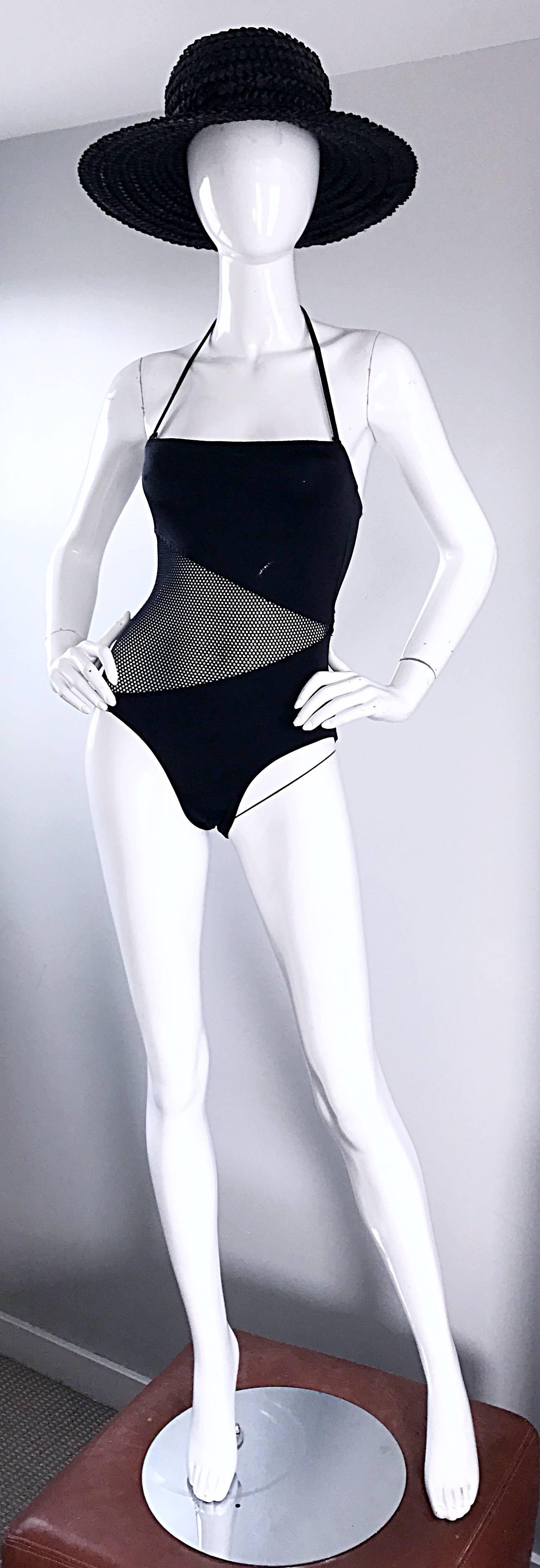 Sexy vintage BILL BLASS black mesh cut-out one piece swimsuit or bodysuit! Features a convertible strap, which means you can wear it as a halter, or strapless! Cut-out mesh detail on the front and back. Looks amazing on! Great for swimwear, or