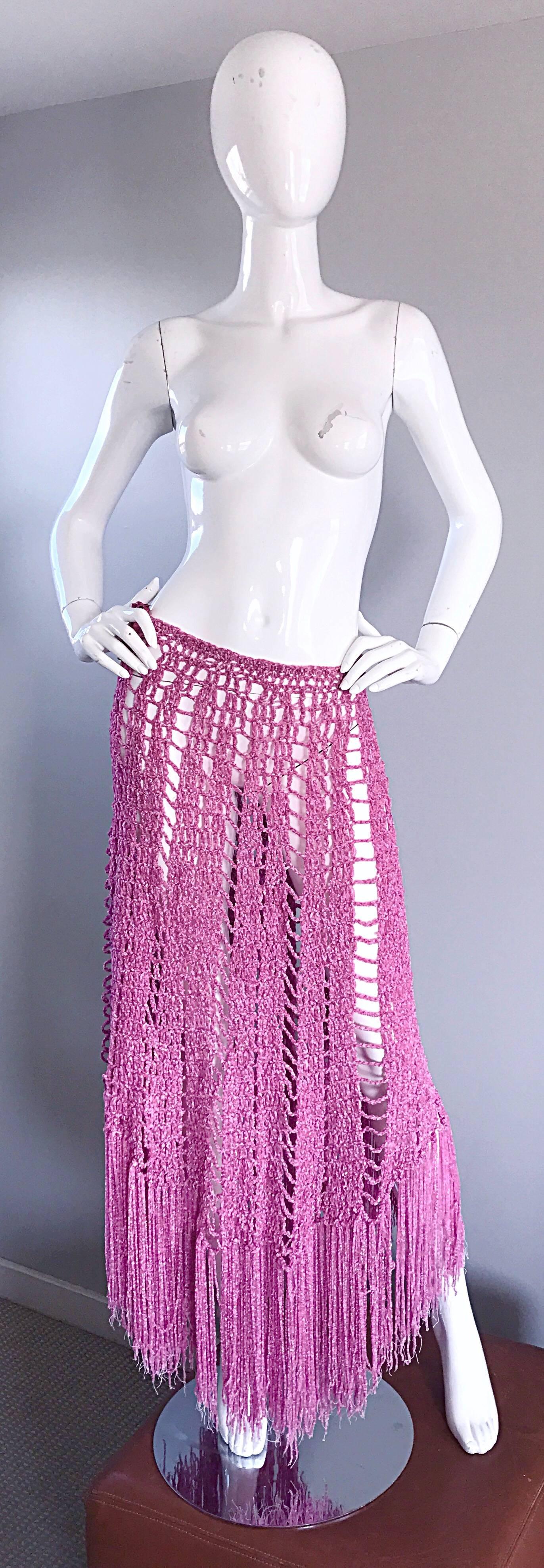 Incredible vintage 70s deadstock JOSEPH MAGNIN pink hand crochet Italian skirt, dress OR poncho / cape! Fringe hem, and side silk tie at waist to adjust size. The perfect piece! Also great as a swimsuit cover up! In great unworn condition. Brand new