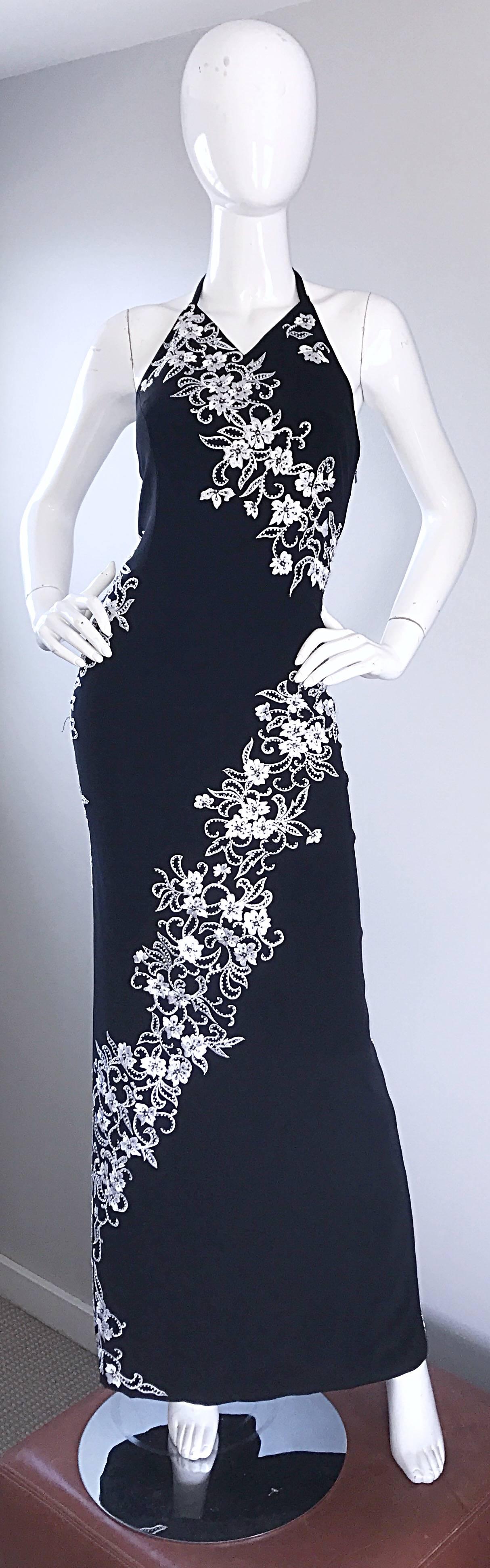Gorgeous vintage BOB MACKIE Asian inspired black and white beaded floral evening dress! Features a flattering crepe rayon fabric, with thousands of hand-sewn beads throughout. High neck, with an Avant Garde column back. Hidden zipper up the side