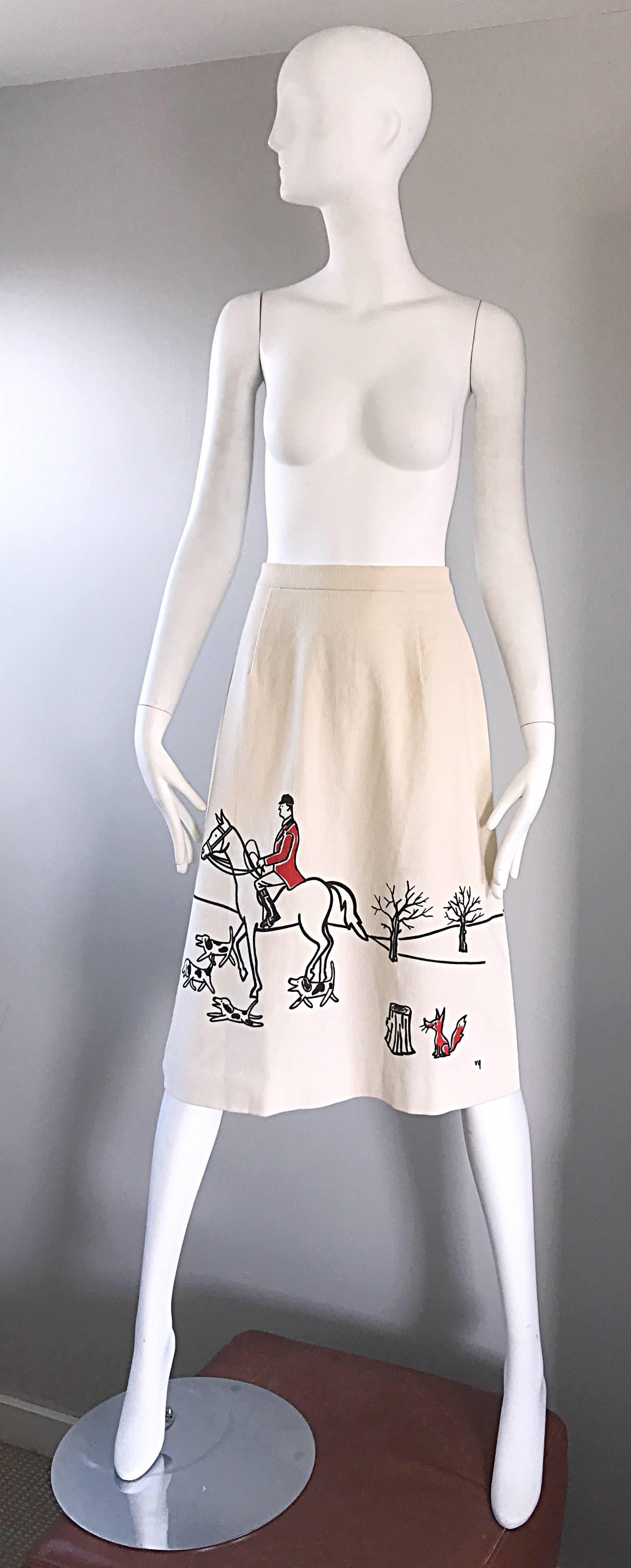 Rare and adorable early 70s VESTED GENTRESS equestrian themed novelty  A-Line skirt! Features a screen-printed scene of a horseman and dogs hunting a fox. Black, red and ivory throughout a soft cotton corduroy. Same print on the front and back,