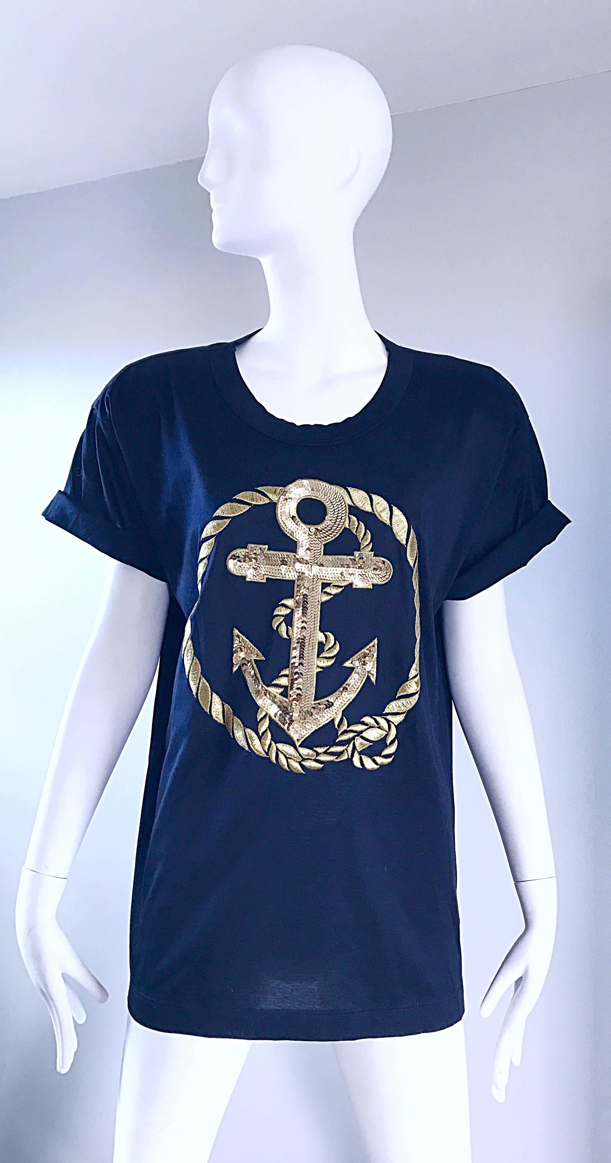 Brand new vintage 1990s / 90s ESCADA, by MARGARETHA LEY navy blue and gold sequined nautical t-shirt blouse! Soft navy blue cotton, with a large gold sequin anchor. Shoulder pads, which can easily be snapped off. Sleeves can be rolled up, as