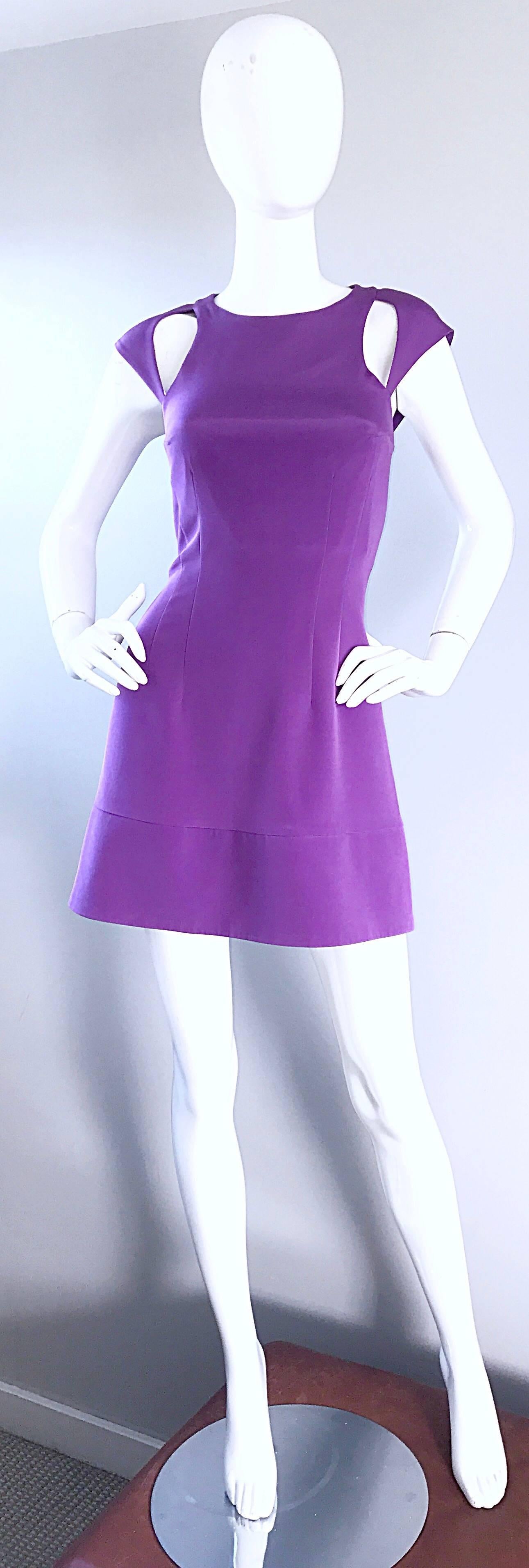 Brand new JAY GODFREY lilac purple silk and lycra cut-out cold shoulder mini dress! Fitted bodice, with a slightly flared skirt that has a 90s feel. 92.5% silk, with 7.5 % lycra. Hugs the body nicely, and stretches to fit. Hidden zipper up the back