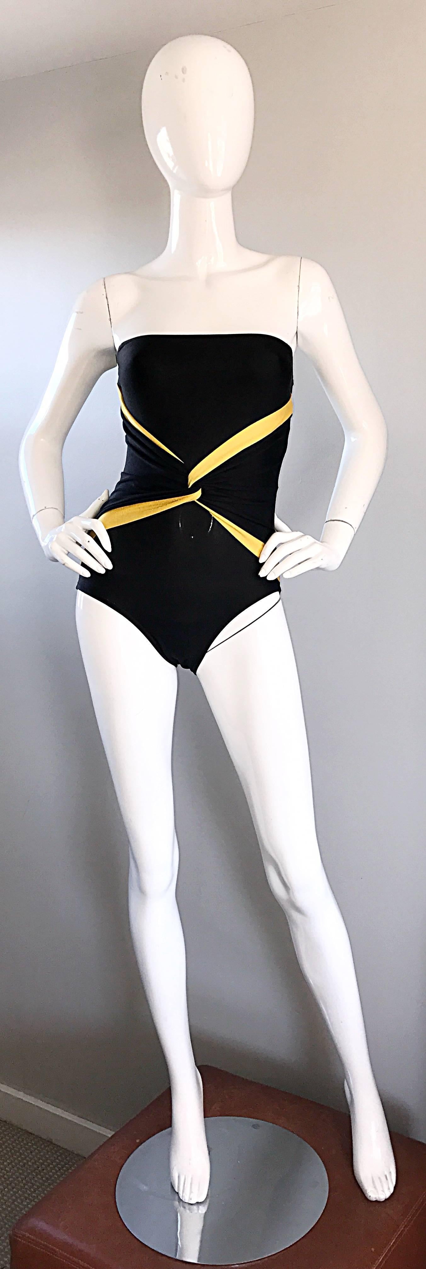 Sexy vintage Early 1990s / 90s OSCAR DE LA RENTA black and yellow 'bumblebee' one piece swimsuit or bodysuit! Strapless style, with lots of stretch. Twisted panels of yellow on the front. Flattering stretch to fit style. Great on the beach, pool or