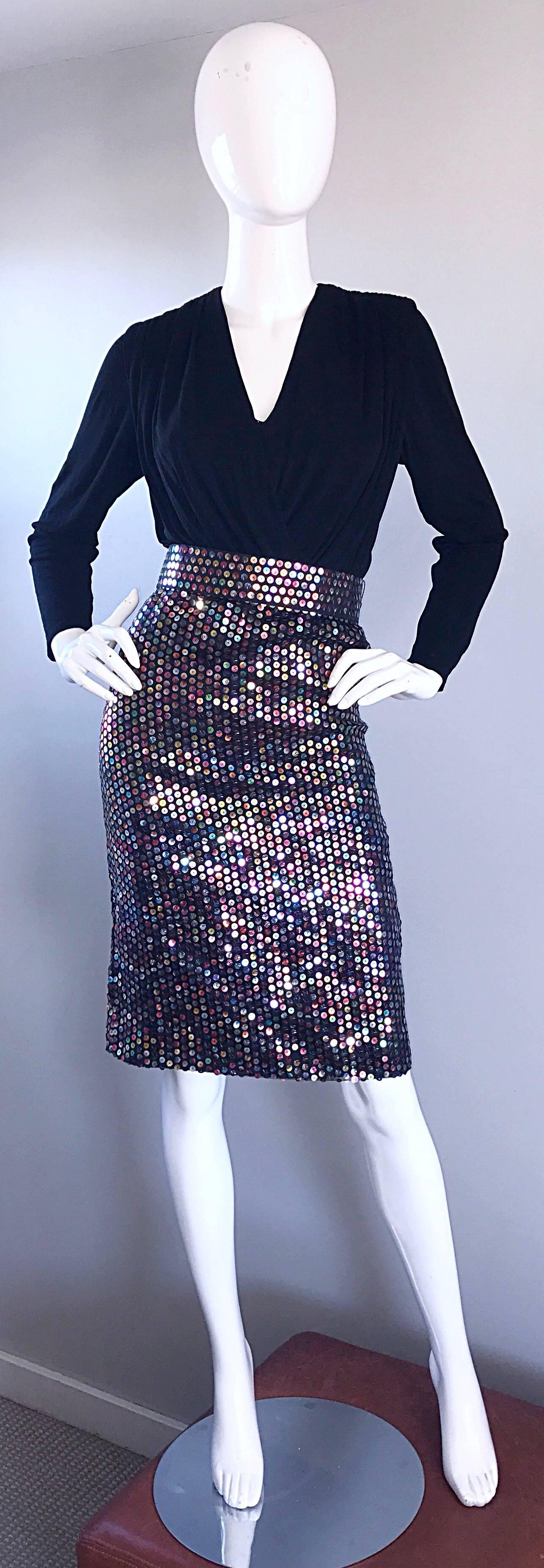 Sexy, they sophisticated vintage 90s LOUISA NEVINS black bodcon belted dress! Features a Grecian inspired jersey bodice, with flattering drapery. Sleek long tailored sleeves. Hundreds of hand-sewn multi color iridescent sequins throughout the entire