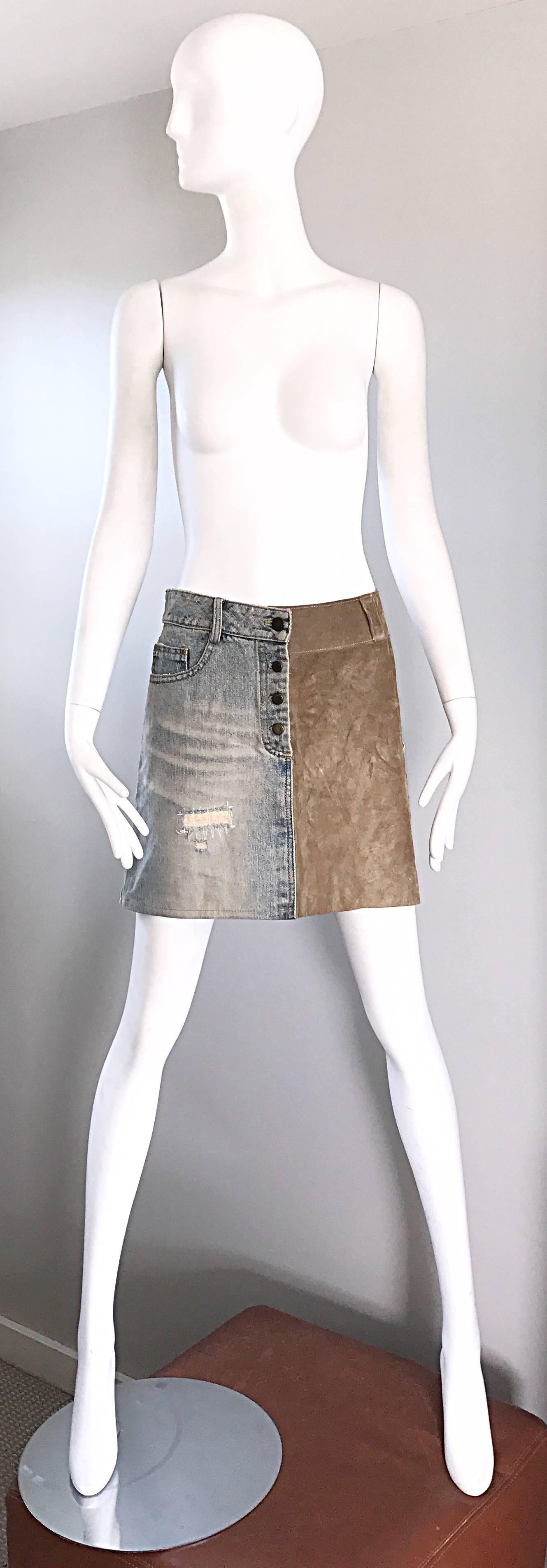 Awesome early 90s DOLCE AND GABBANA taupe suede and light blue denim low waisted mini skirt! Features taupe / light brown distressed suede, and light blue distressed denim. Brass buttons up the fly and at waist. Criss-Cross suede laces up the side.