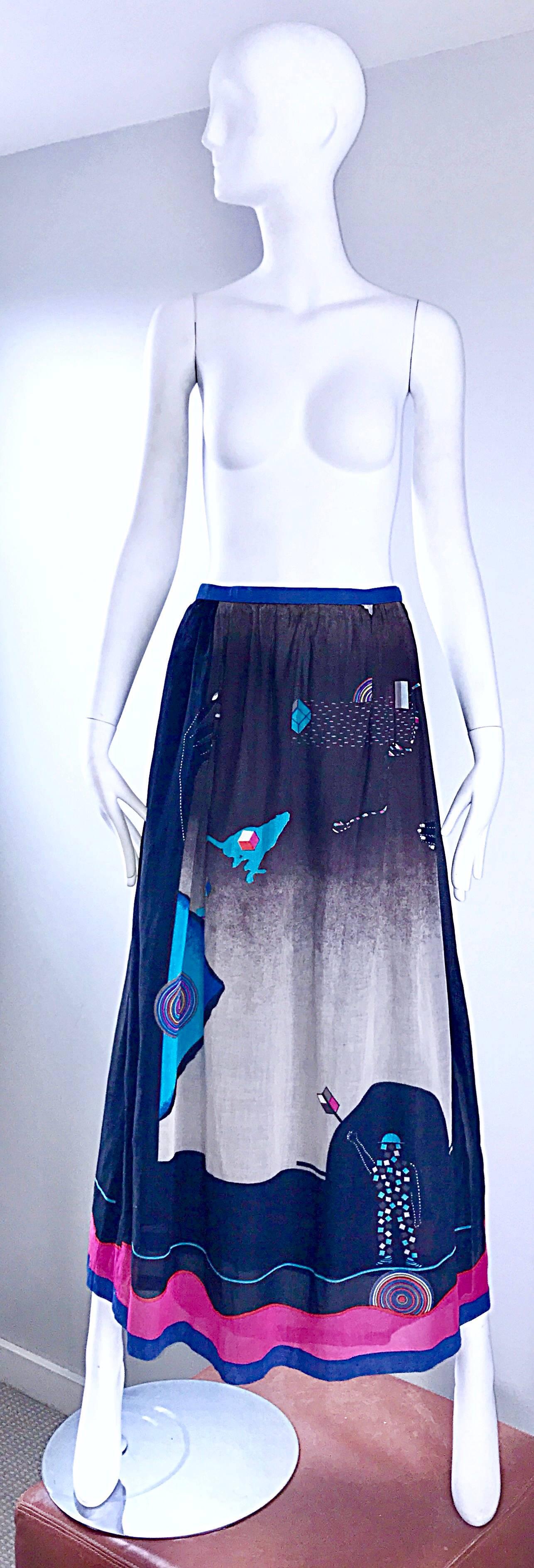 I have had the pleasure of owning a number of HANAE MORI pieces, but this is by far my FAVORITE! This 1970s lightweight cotton maxi skirt features a futuristic / surrealistic theme. Vibrant hues of violet, pink, blue, teal, black and grey. 3-D