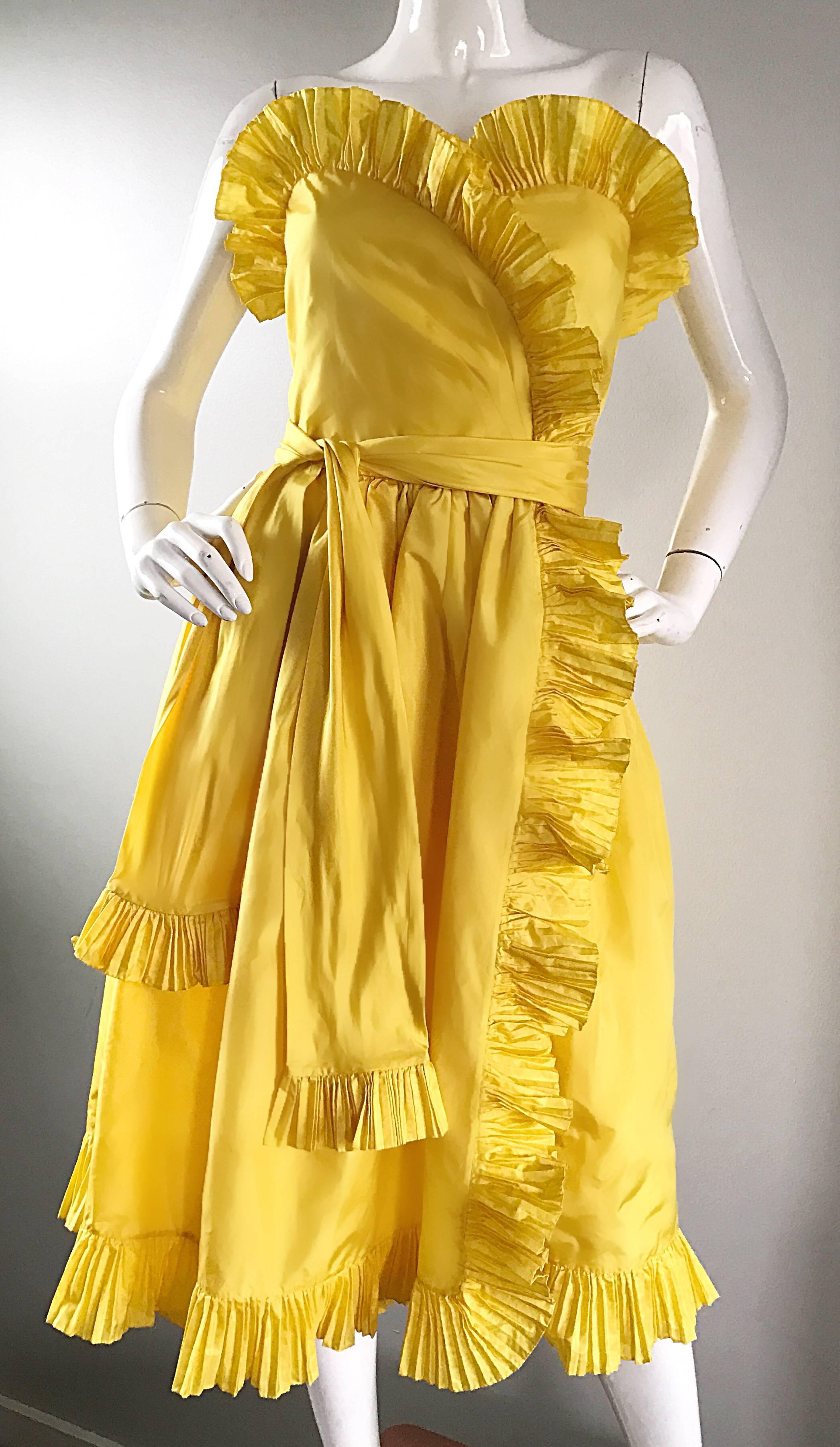 Beautiful vintage 80s BILL BLASS canary yellow silk taffeta origami strapless cocktail dress AND matching sash belt! The perfect yellow color! Origami like ruffles along the bust, side skirt, and hem. Sash also features pleated ruffles at each end.