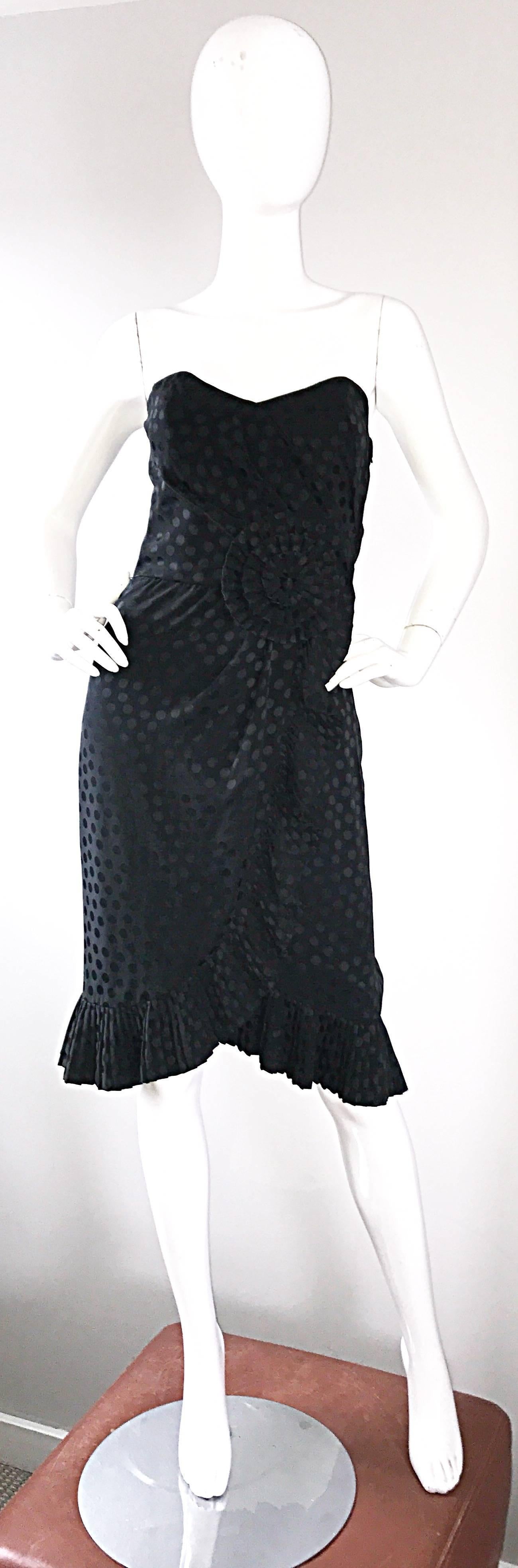 Chic vintage ALBERT NIPON 90s black strapless silk dress! Features black polka dots throughout, origami pleated side waist detail, and a pleated hem. Such a a flattering little black dress, with so much attention to detail. Interior boning and