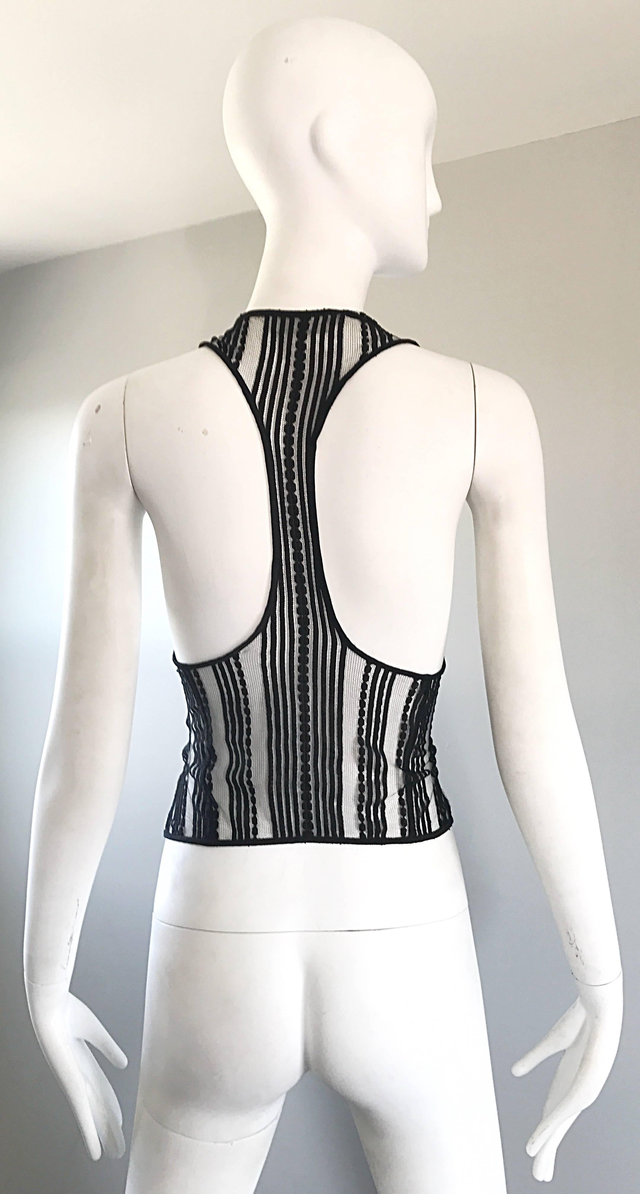 Early 2000s RICHARD CHAI black and white military and bondage inspired waistcoat! Features tiny vertical black and white stripes on the front, and a pure black lace racerback. Hook-and-eye closures up the front. Great layered or alone. The