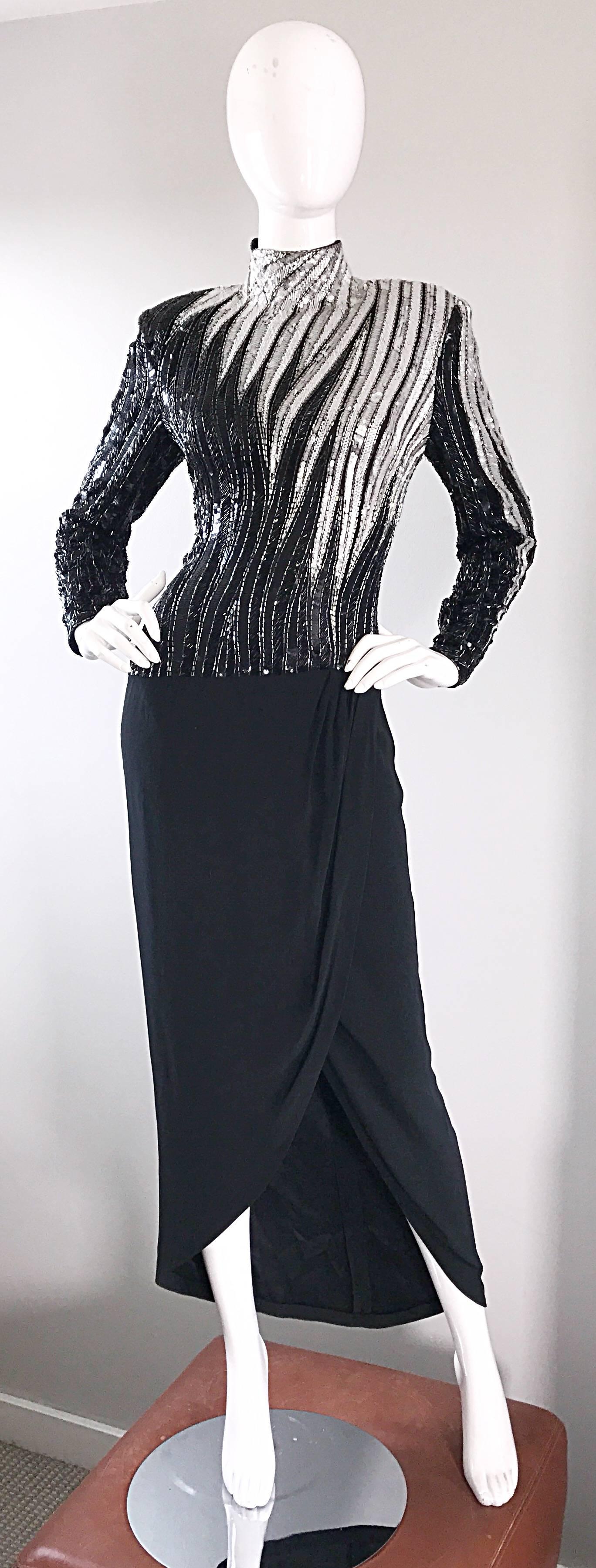 Exceptional vintage 1980s BOB MACKIE black, silver and white heavily beaded and sequined nigh neck evening dress! Features thousands of hand-sewn sequins and beads throughout the bodice. Features dramatic Balmain like sleeves, with shoulder pads