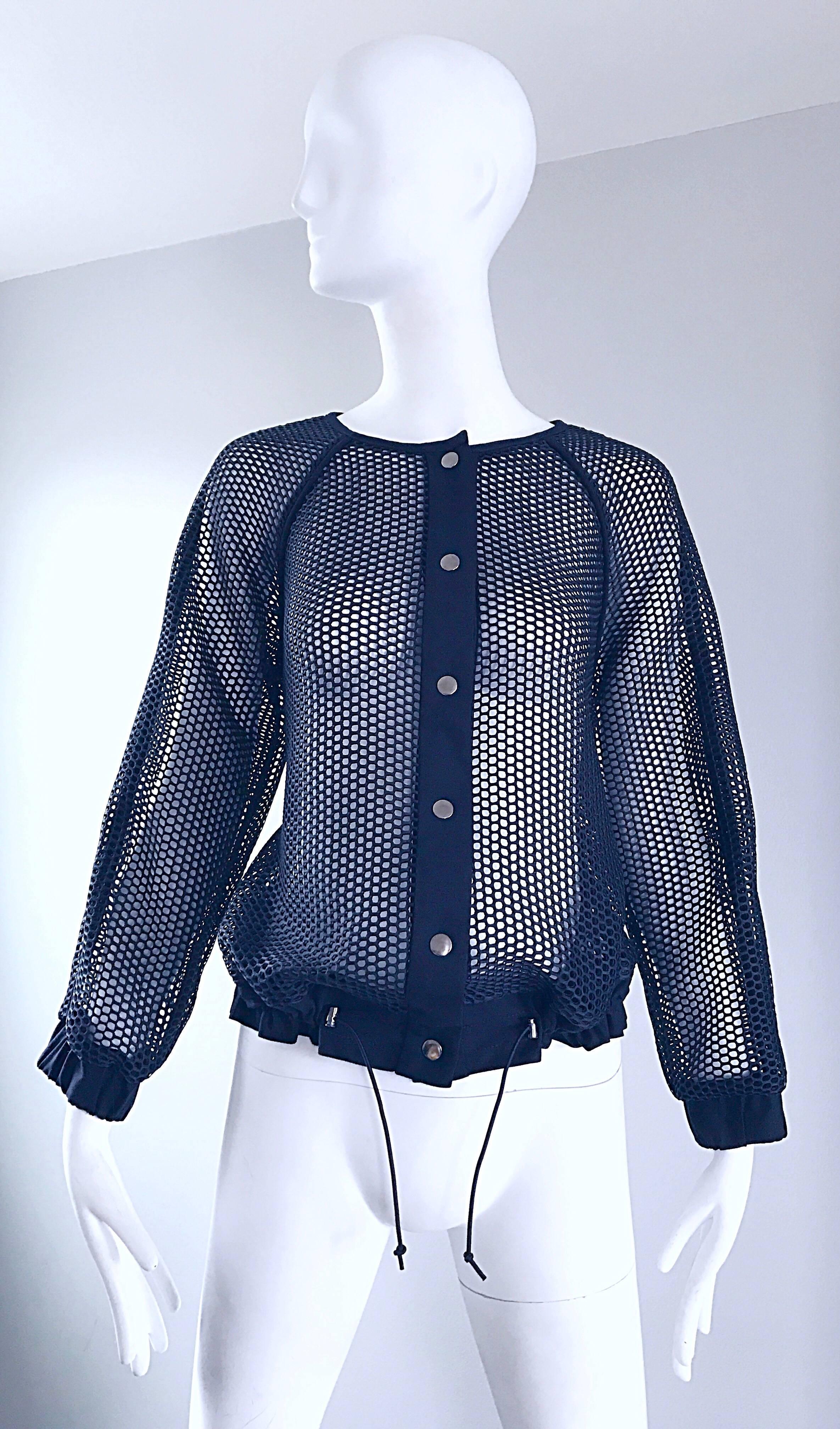 Brand new with original $795 price tag LAVER nautical jacket! Classic navy blue color. Chic cut-out net gives this jacket just the right amount of edge! Snaps up the front. Drawstring waistband can adjust to fit, and will work for an array of sizes.