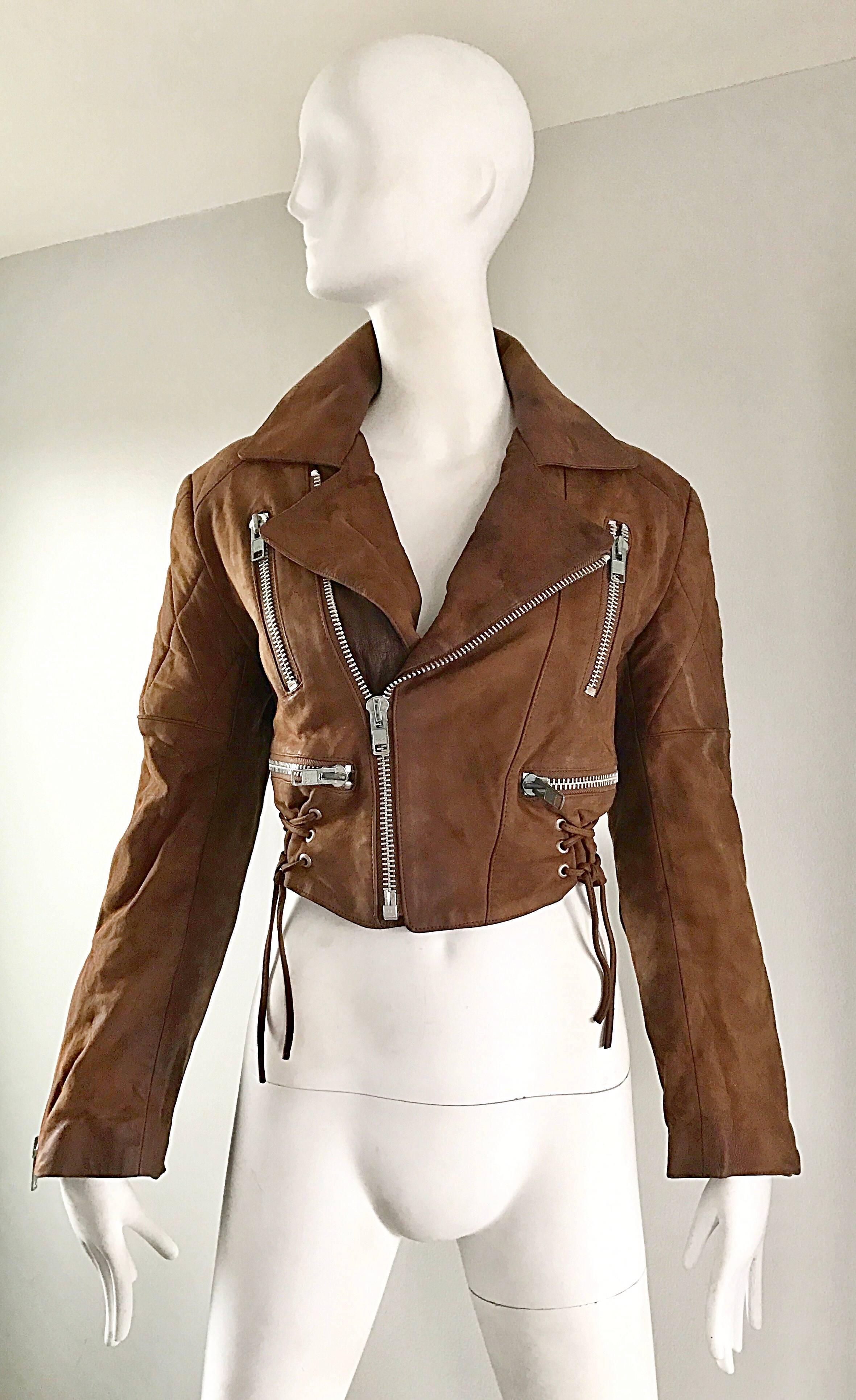 Awesome 1980s MICHAEL HOBAN for NORTH BEACH LEATHER light brown distressed leather cropped motorcycle jacket! Features super soft distressed leather, with large silver metal zipper details thorughout. Four large pockets on the front bodice zip shut.