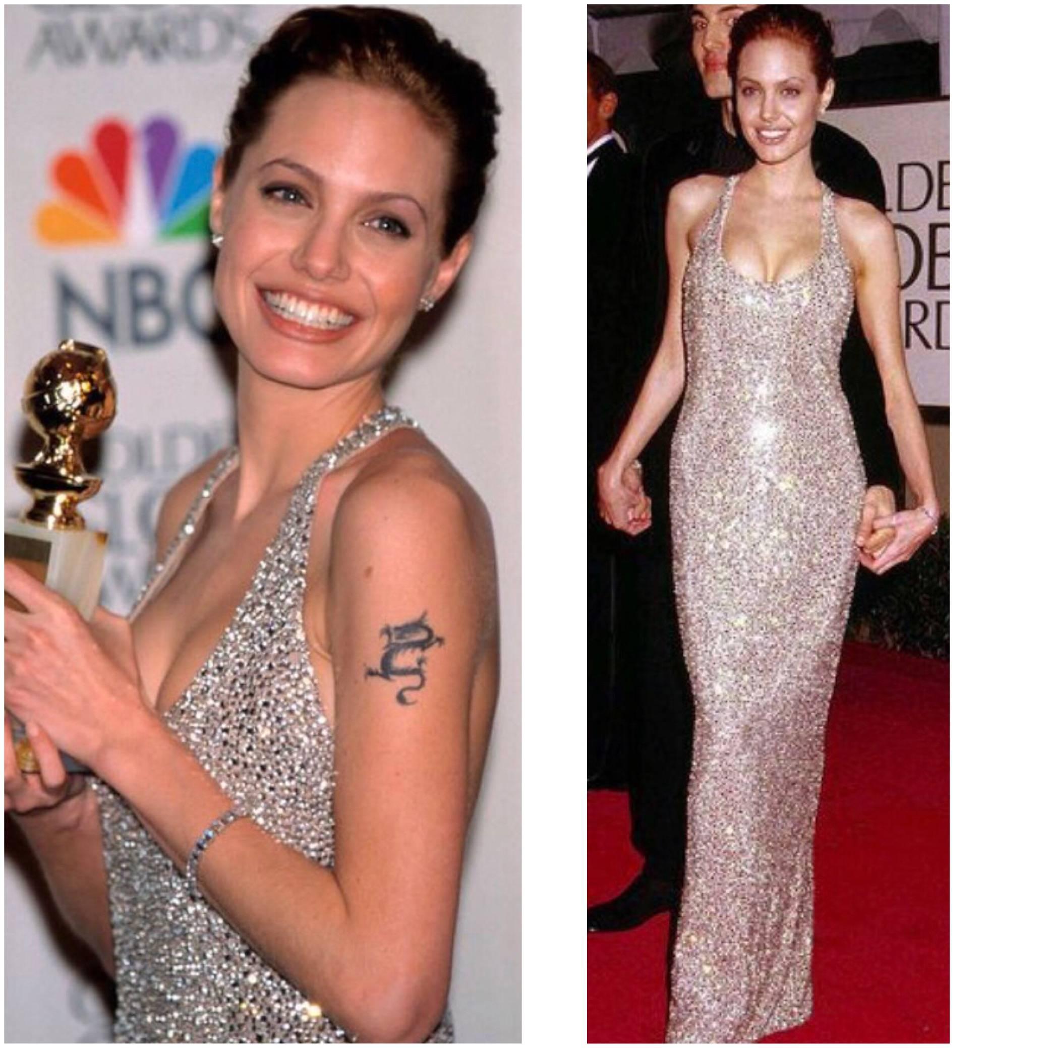 Featuring the same RANDOLPH DUKE evening dress (in a gunmetal color) that Angelina Jolie wore when she accepted her Golden Globe in 1999 when she won for her role in, "GIA"! Words cannot even begin to describe how insanely gorgeous this