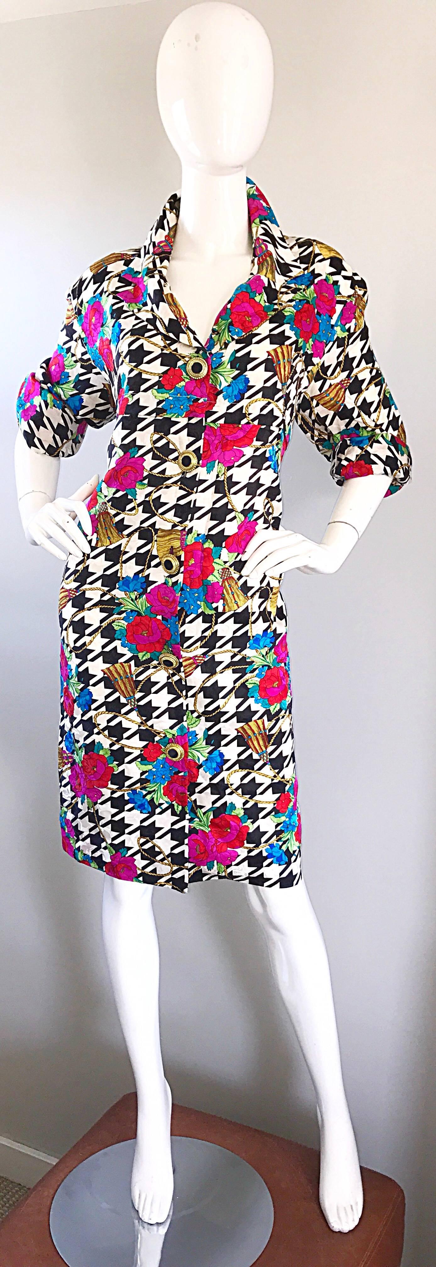 Incredible vintage 90s houndstooth silk shirt dress! Features vibrant pink, red, blue and green floral print, with golden printed ropes throughout the houndstooth. Black and gold decorated up the front, with matching buttons at sleeve cuffs. Very