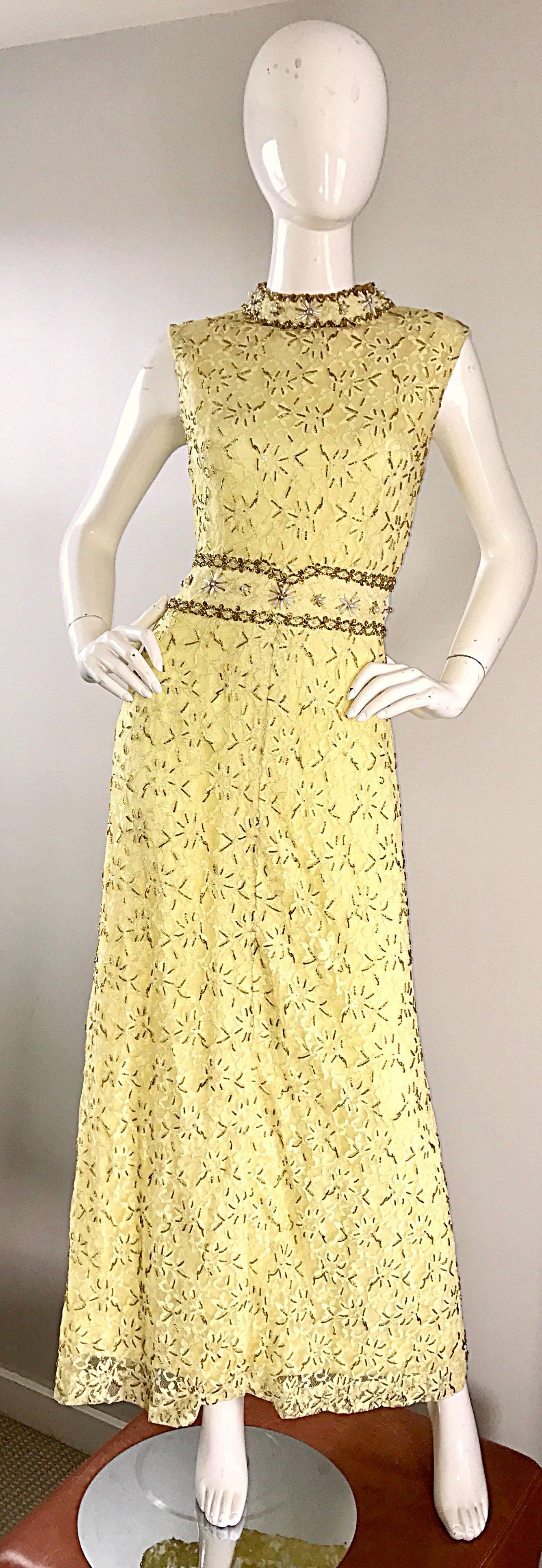 Elegant 60s yellow silk lace beaded, sequined, and pearl evening dress! Features a chic high neck, with a wonderful fitted bodice. Beaded waistband dips at center waist, and is super flattering. Thousands of hand-sewn sequins, beads and pearls