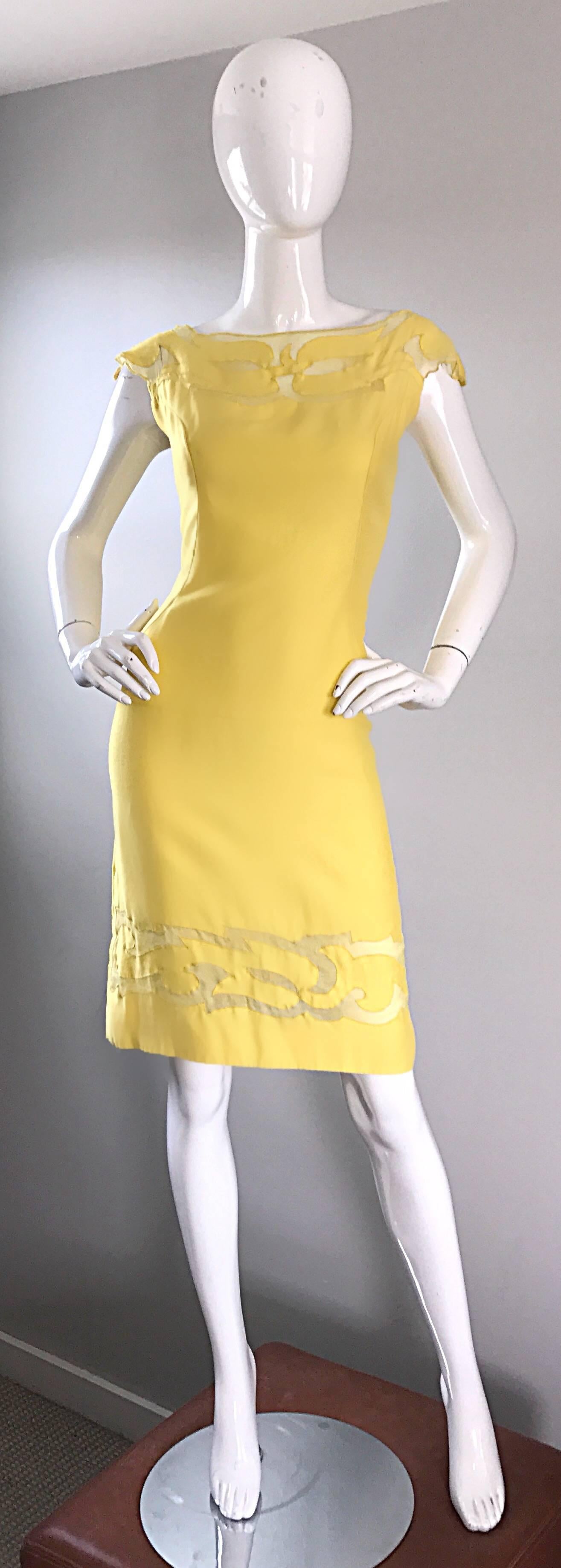 The perfect yellow dress for spring and summer! This fine mid century gem features cut-outs above the bust, and at hem. Cut-outs feature a sheer layer of yellow silk underneath. High quality, with lots of attention to detail. Hugs the body