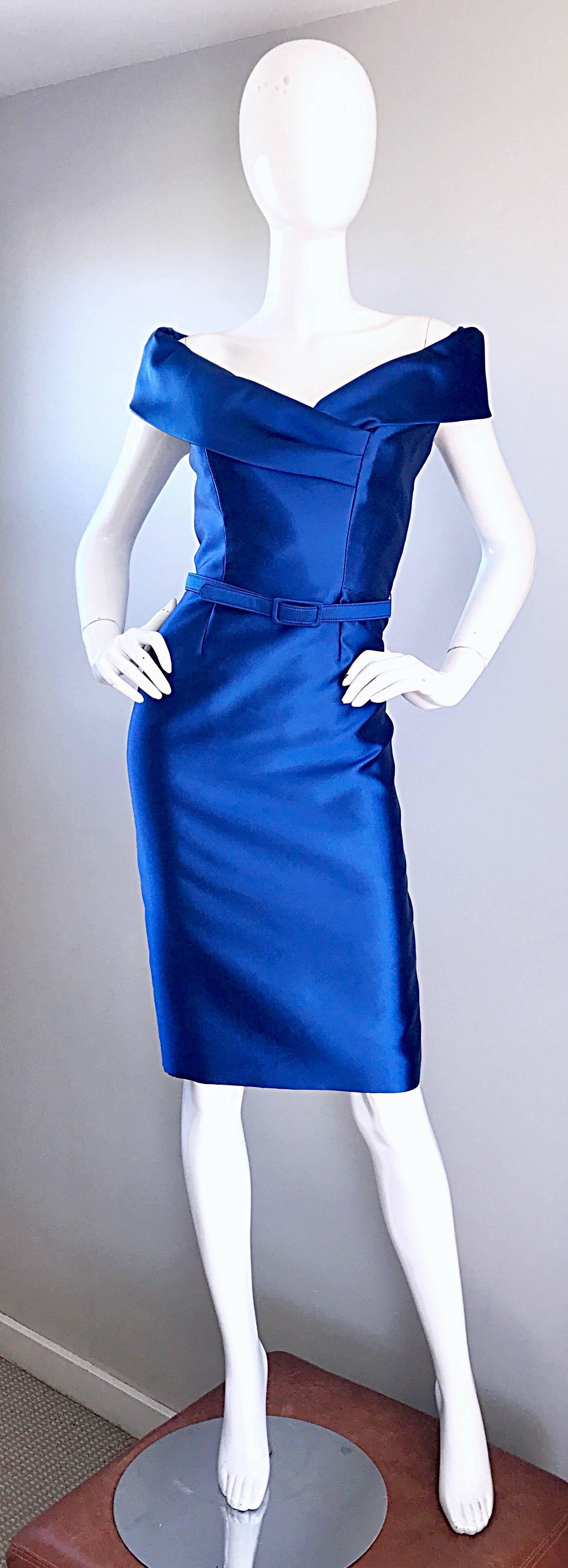 Sensational CATHERINE REGEHR $3,250 vibrant royal blue off-the-shoulder belted dress! Flattering body hugging fit looks amazing on! Features a matching detachable belt. Couture workmanship with so much attention to detail. Hidden zipper up the back