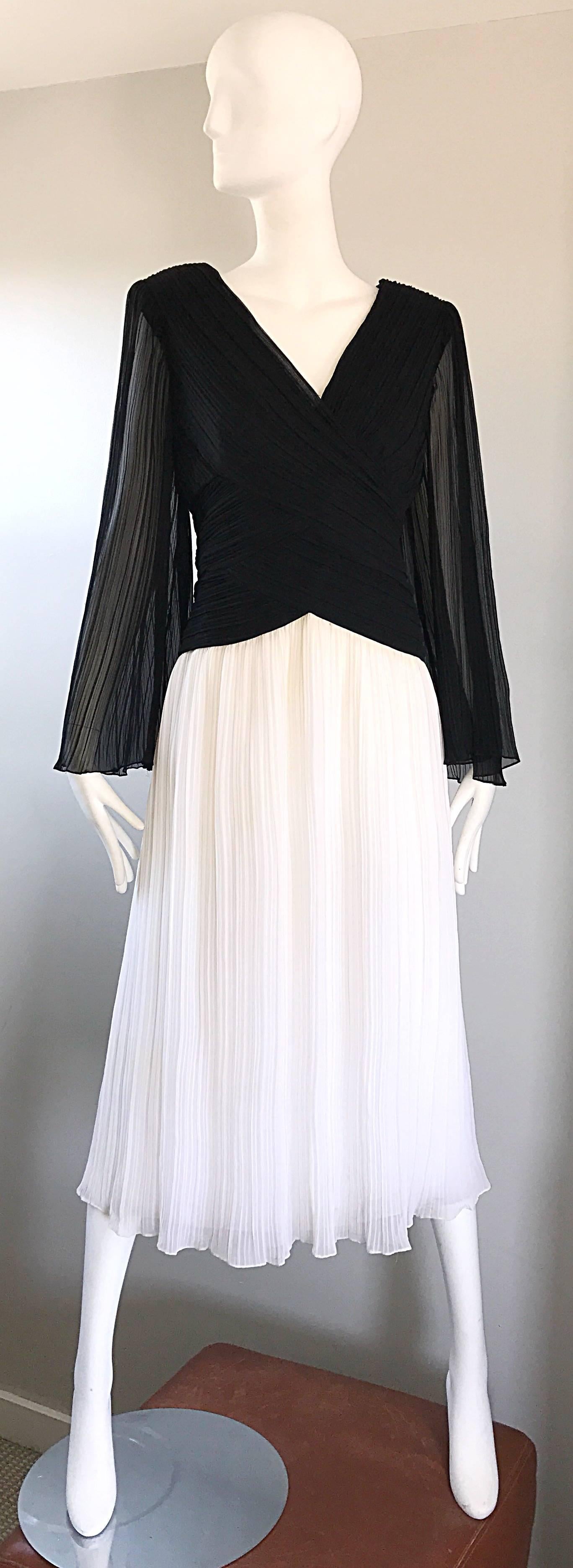 Spectacular vintage late 1970s JILL RICHARDS black and white micro pleated chiffon midi dress! Features a black chiffon fitted bodice, with a white full midi skirt. Fantastic wide bell sleeves. Couture quality, with so much attention to detail. Most