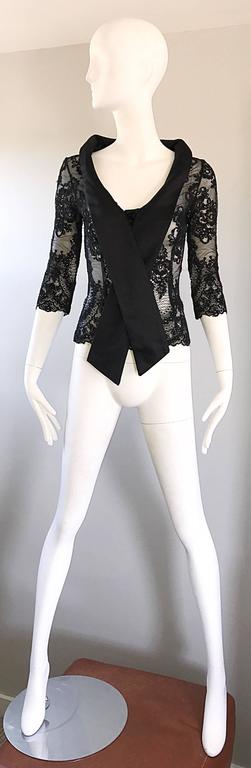 Beautiful vintage 90s ROSE TAFT Couture black chantilly lace 3/4 sleeve oversized shawl top! Flattering tailored bodice, with sleek 3/4 length sleeves. Oversized round silk satin collar that criss crosses on the front. Hidden satin covered buttons
