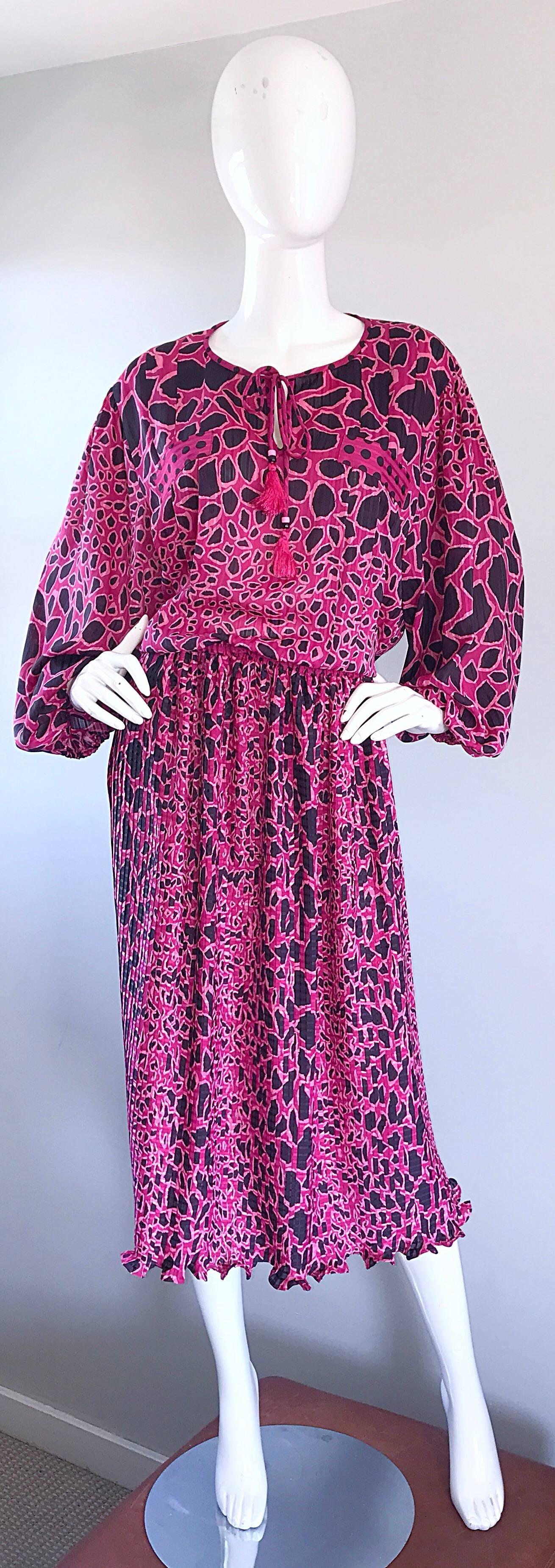 Incredible vintage plus size DIANE FREIS hot pink and black cheetah print blouse and skirt set! Signature Diane Fres fit, with a lose fitting bodice, and full dolman sleeves. Features ties above the bust with fringed tassels and beads. Elastic